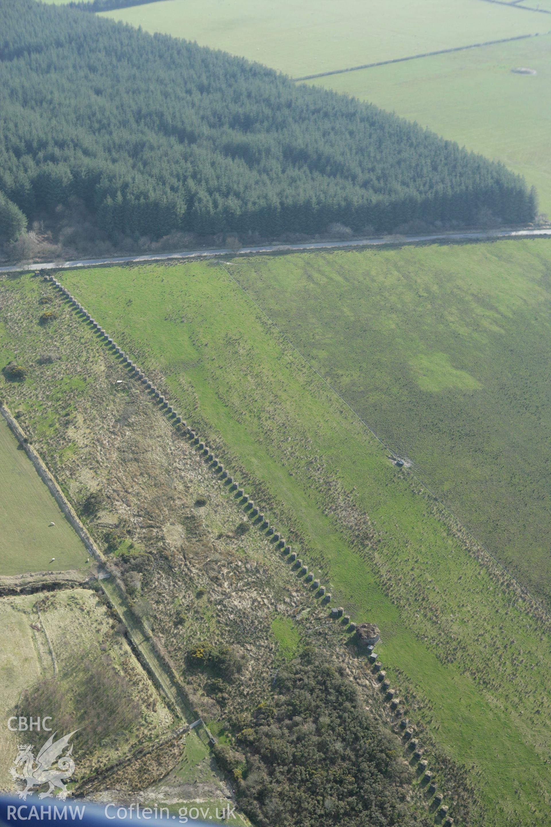 RCAHMW colour oblique aerial photograph of Rhos Llangeler Stop Line. Taken on 13 April 2010 by Toby Driver
