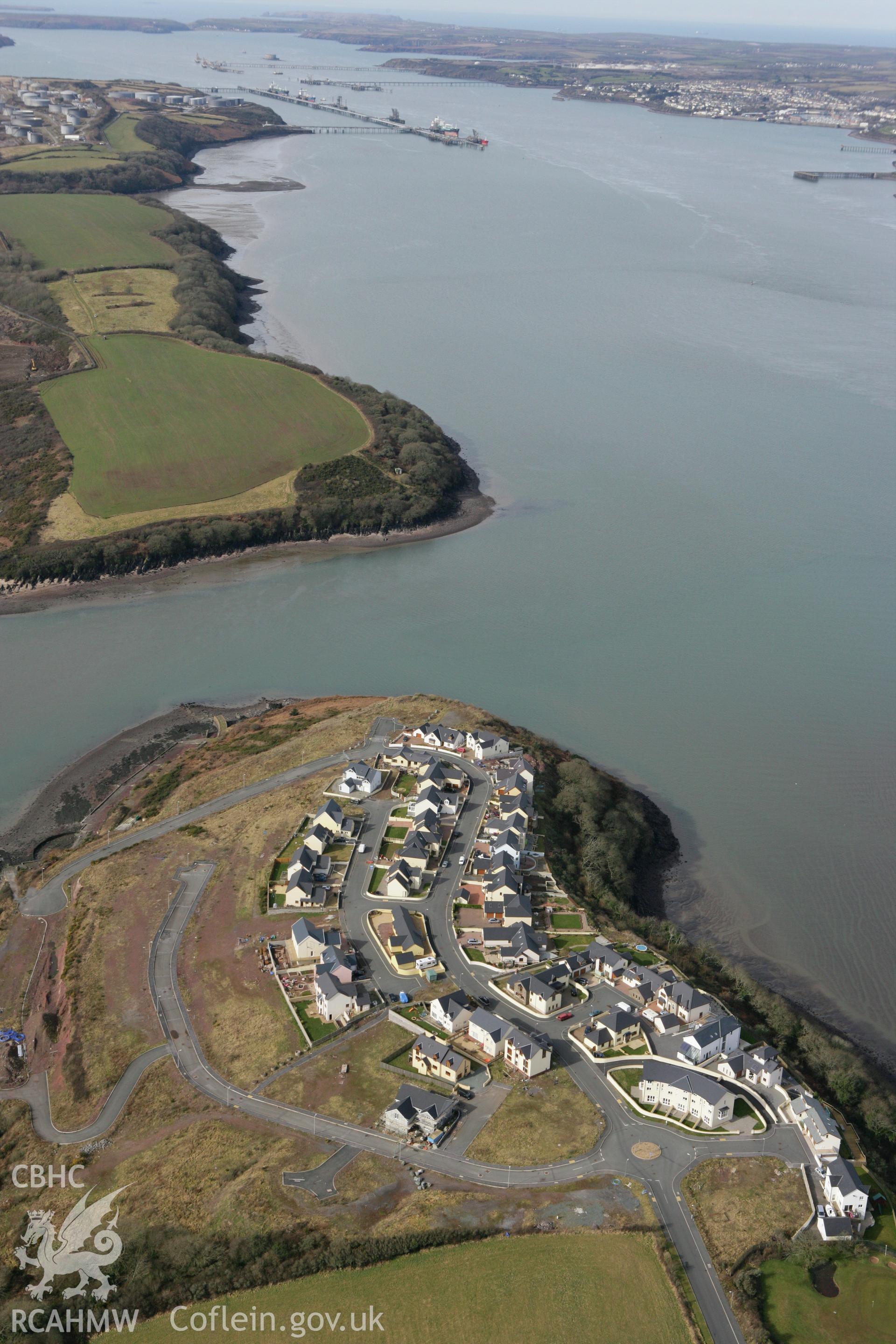 RCAHMW colour oblique aerial photograph of a pillbox in Pennar Point landscape, Pembroke. Taken on 02 March 2010 by Toby Driver