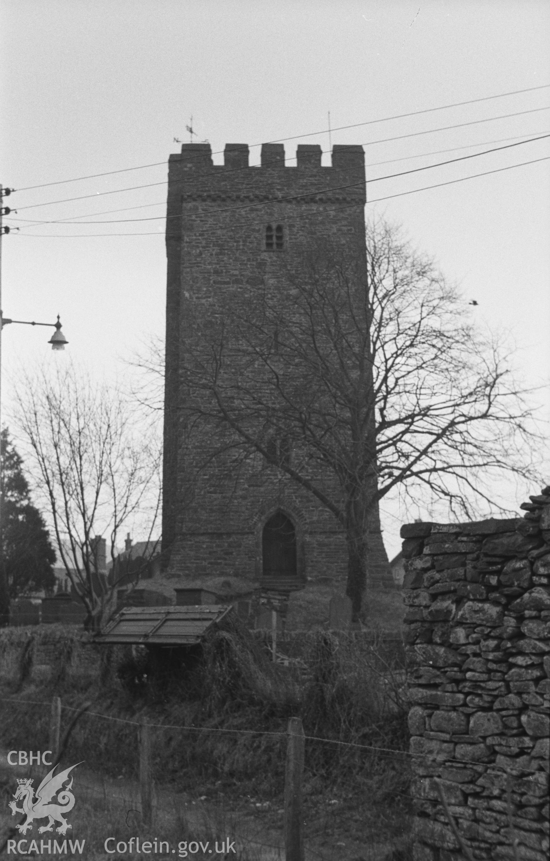 Digital copy of a black and white negative showing exterior view of the bell tower at St. Caron's Church, Tregaron. Photographed in April 1963 by Arthur O. Chater from the edge of the river at SN 6795 5967, looking east north east.