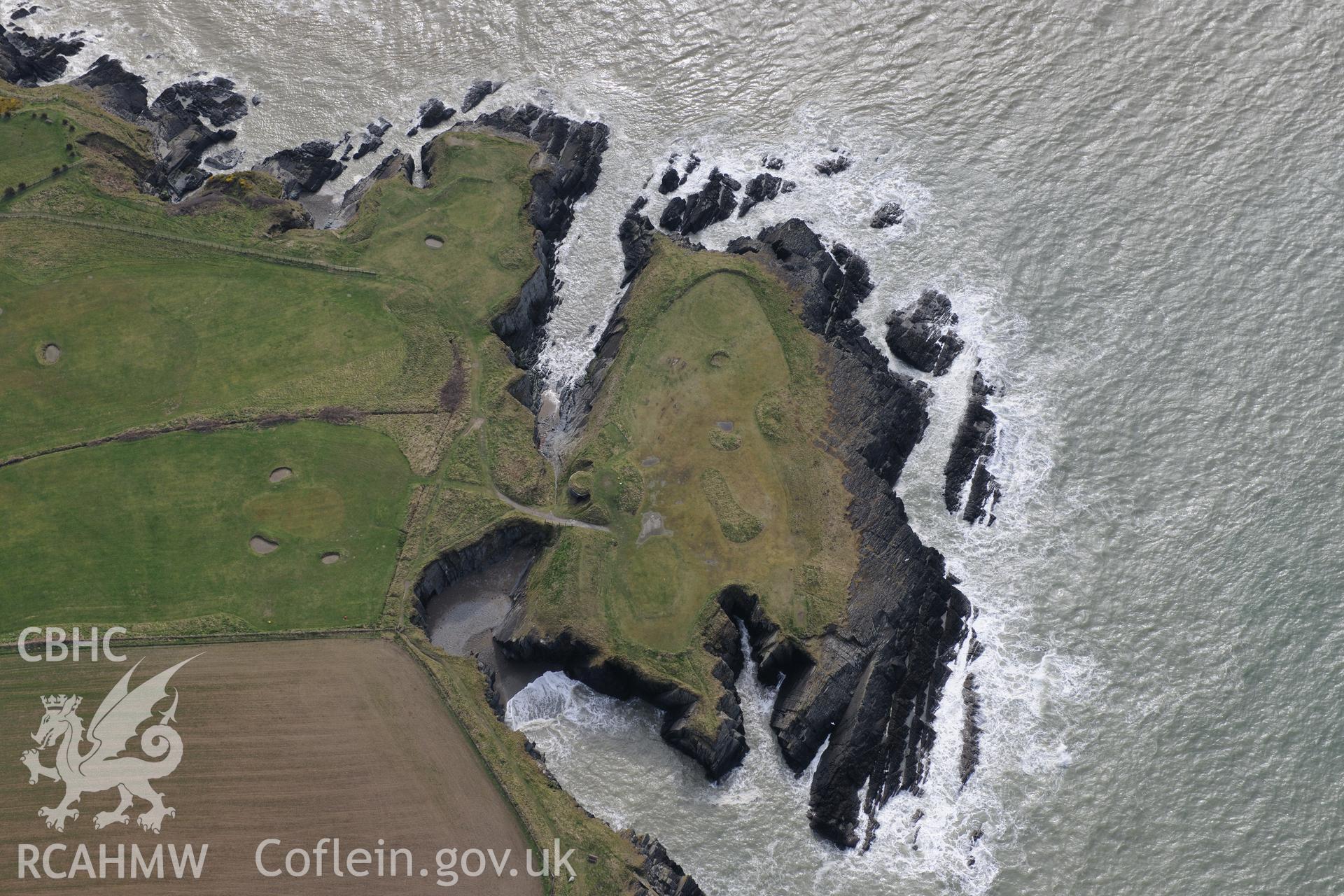 Craig-y-Gwbert and the site of former Craig-y-Gwbert lime kiln, Gwbert, near Cardigan. Oblique aerial photograph taken during the Royal Commission's programme of archaeological aerial reconnaissance by Toby Driver on 13th March 2015.