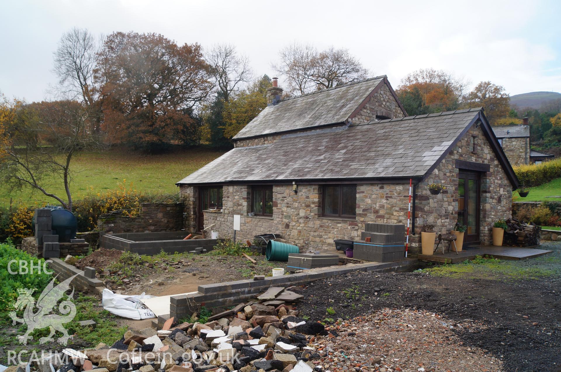 View looking southwest at Little Pentre farmhouse. 'The modern extension blocks the view of the original barn attached to its north-northeastern side.' Photographed and described by Jenny Hall and Paul Sambrook of Trysor, November 2018.