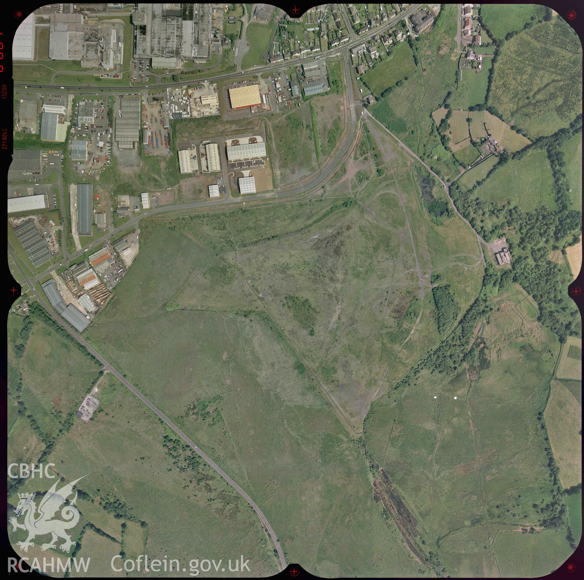 Digitised colour aerial photograph taken in May 1992. Part of material used in a Setting Impact Assessment of Land off Phoenix Way, Garngoch Business Village, Swansea, carried out by Archaeology Wales, 2018. Project number P2631.