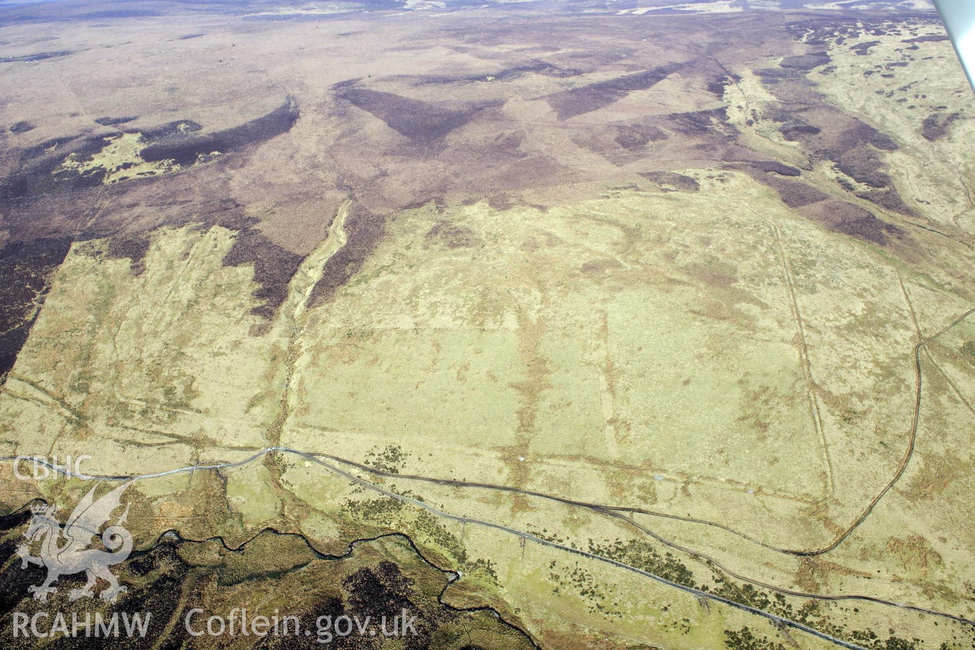 Pen Plaenau Roman Marching Camp, in the Berwyn Mountains south west of Llangollen. Oblique aerial photograph taken during the Royal Commission?s programme of archaeological aerial reconnaissance by Toby Driver on 28th February 2013.