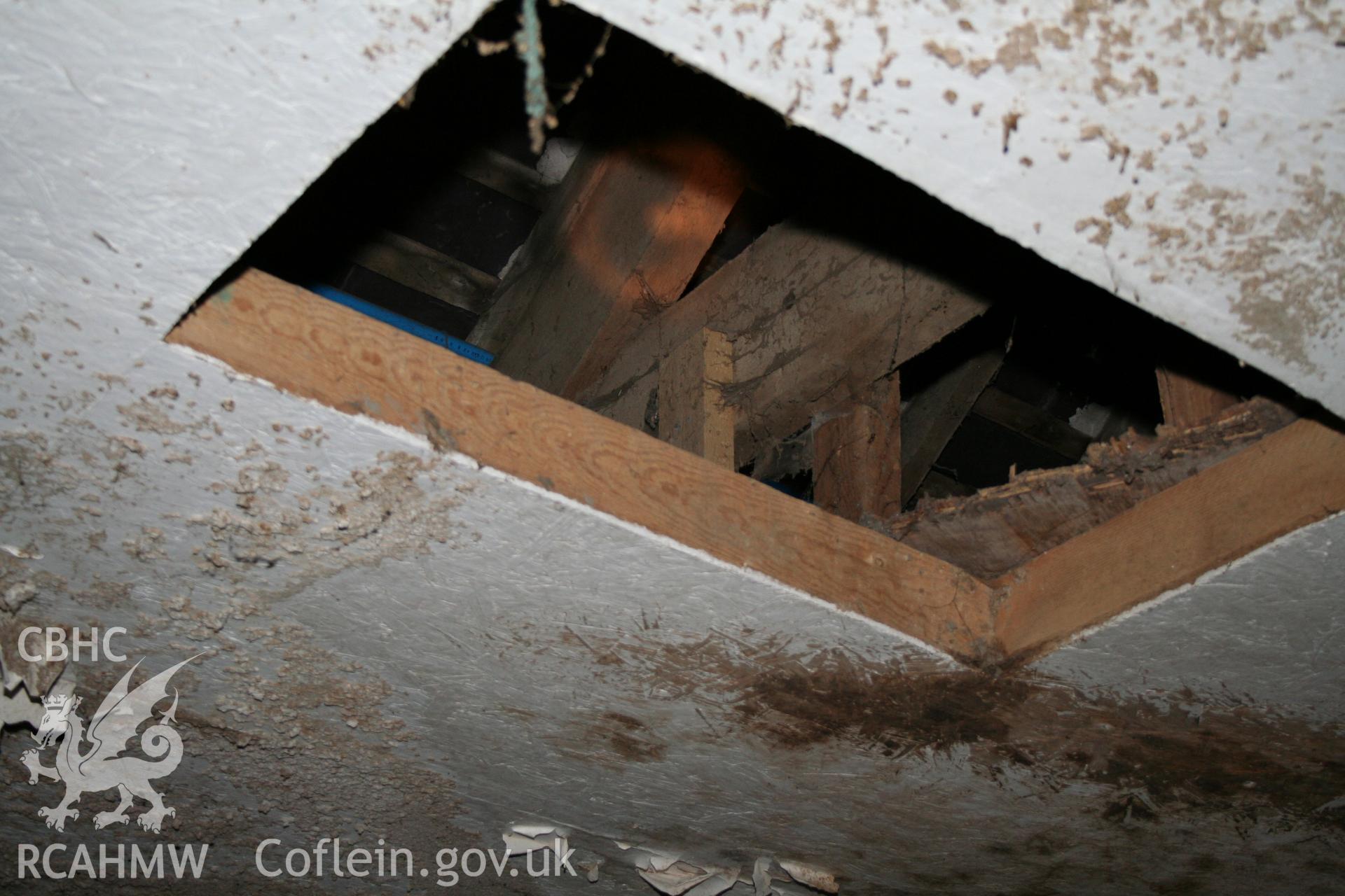 Interior view looking up at rafters in cattle shelter. Photographic survey of the southern range of cowhouses at Tan-y-Graig Farm, Llanfarian. Conducted by Geoff Ward and John Wiles, 11th December 2006.