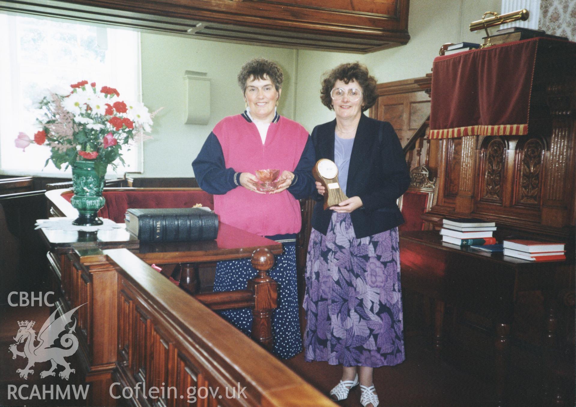 Colour photograph of Rowens Griffiths & Catherine Jones following a presentation marking their service to the chapel Sunday School. Donated as part of the Digital Dissent Project.
