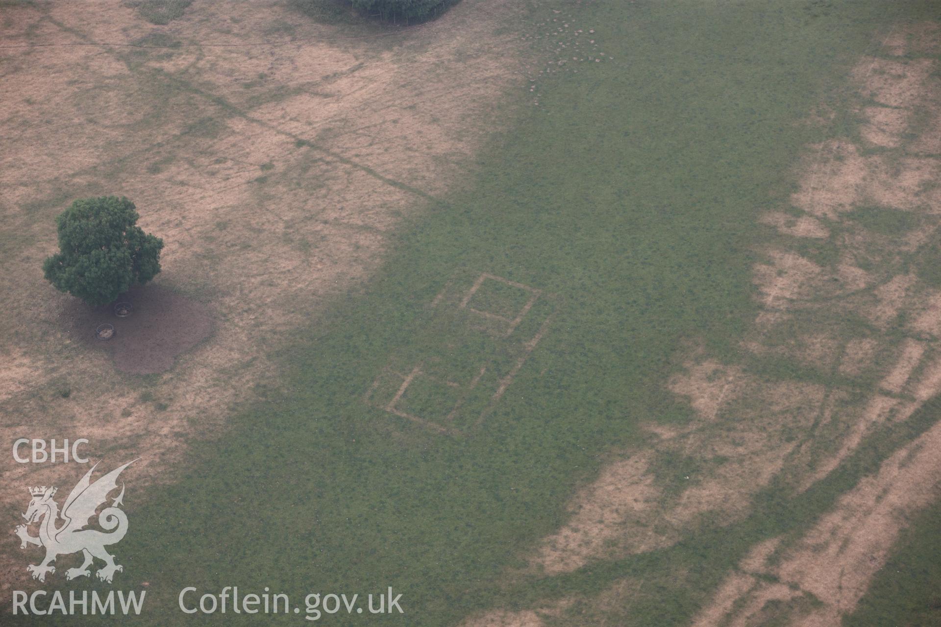 Royal Commission aerial photography of Wyndcliff Roman villa and hillfort taken during drought conditions on 22nd July 2013.