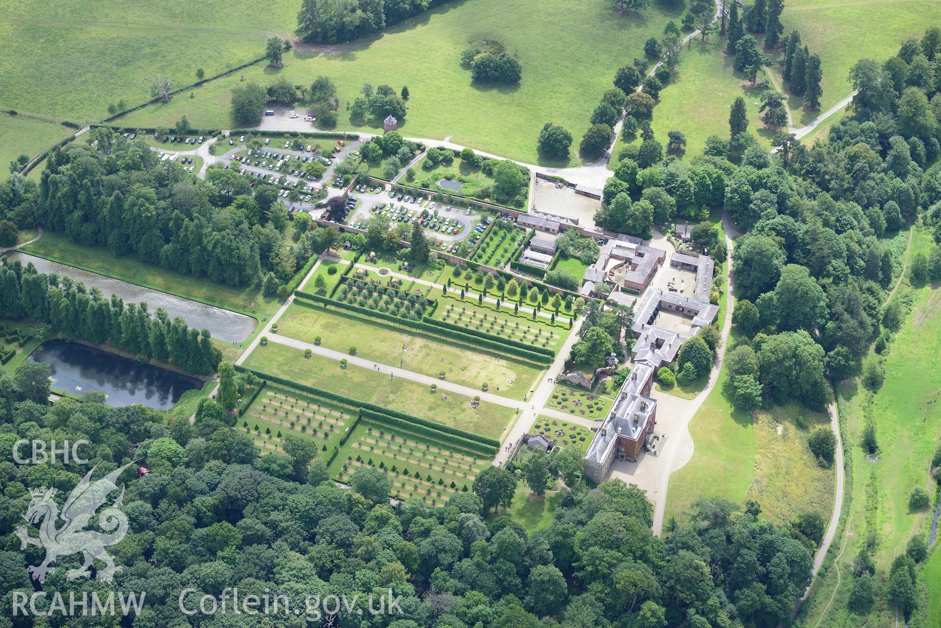 Erddig Hall including garden, stables and gardener's cottage. Oblique aerial photograph taken during the Royal Commission's programme of archaeological aerial reconnaissance by Toby Driver on 30th July 2015.