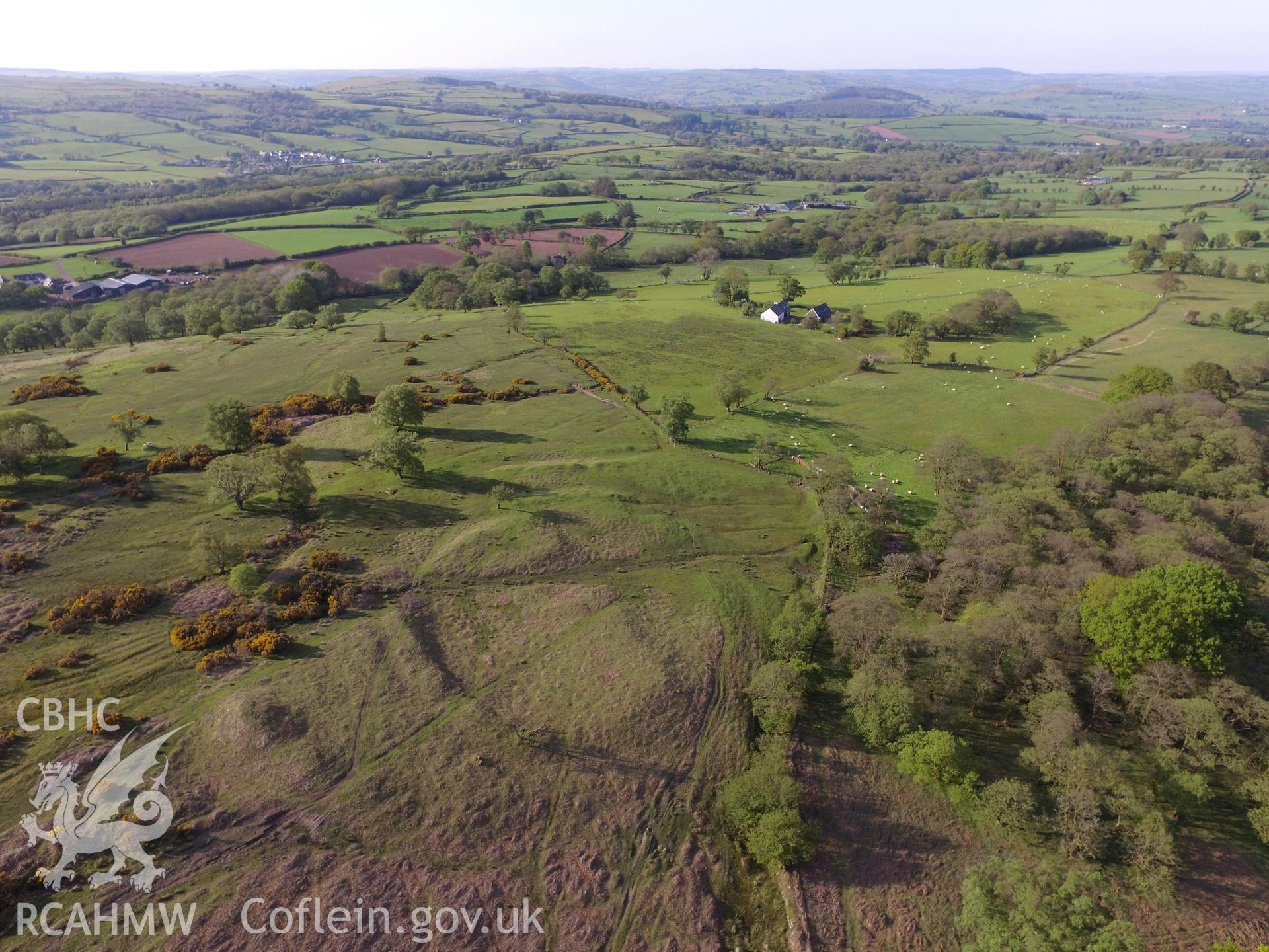 Colour photo showing aerial view of Nant Cwm Llwch enclosure (Llwyn Bedw settlement), taken by Paul R. Davis, 17th May 2018.