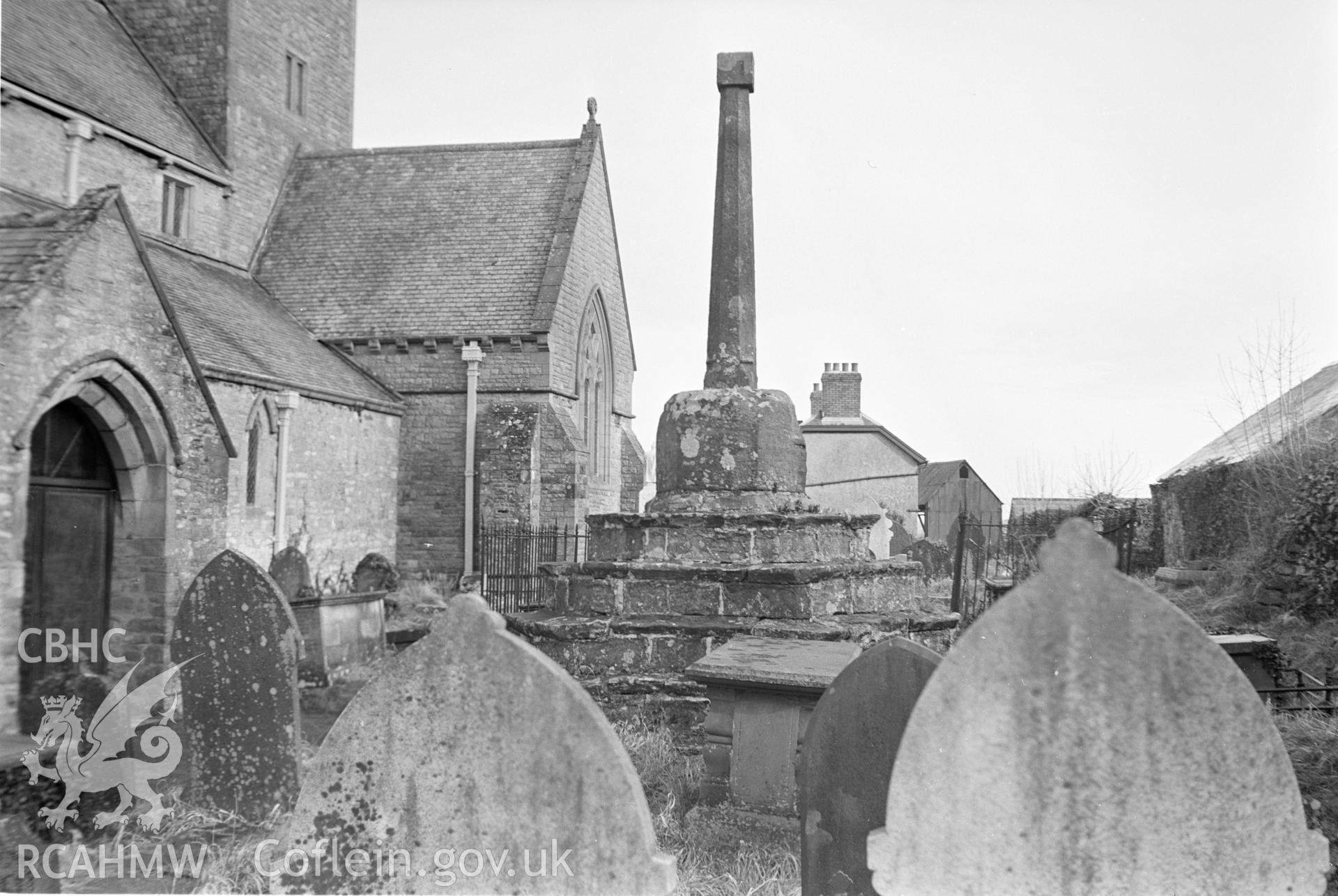 Digital copy of a black and white negative showing Coychurch churchyard cross.