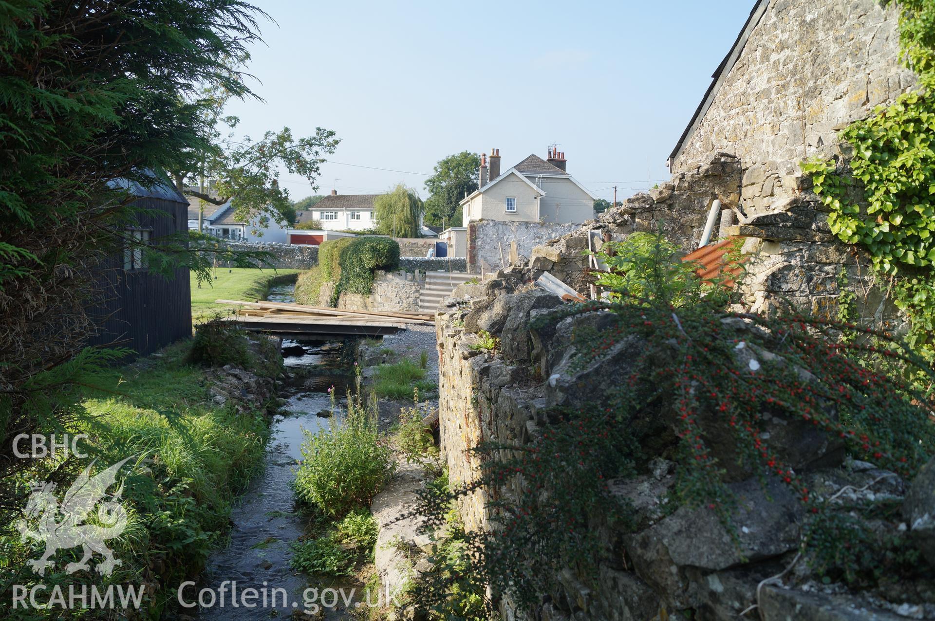 View 'looking north northwest along small watercourse to the west of the building with ruined pigsty and yard to the right of the photograph' at Rowley Court, Llantwit Major. Photograph & description by Jenny Hall & Paul Sambrook of Trysor, 7/9/2016.