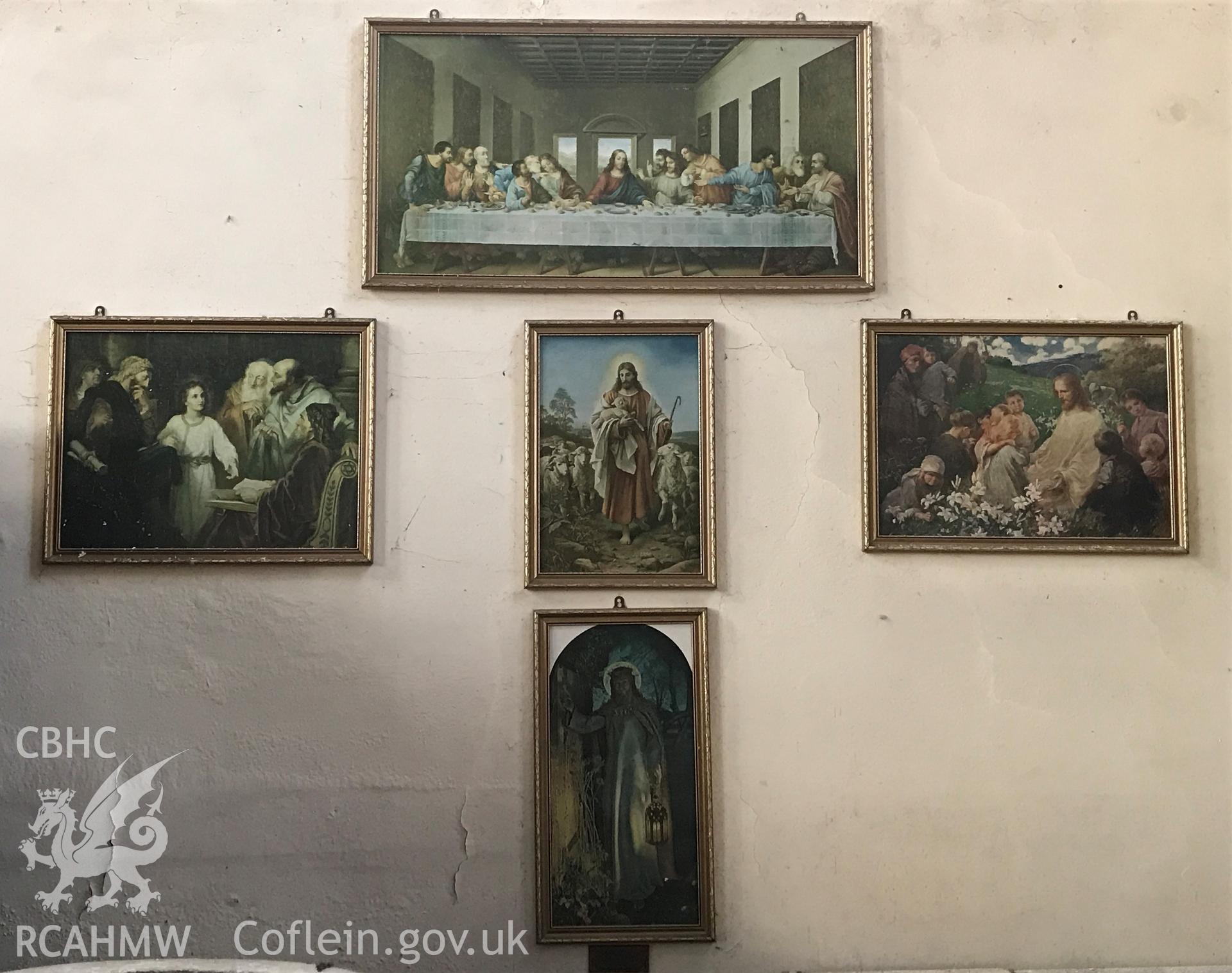 Colour photo showing wall-mounted framed pictures at St Paul's Church, Grangetown, taken by Revd David T. Morris, 2018.