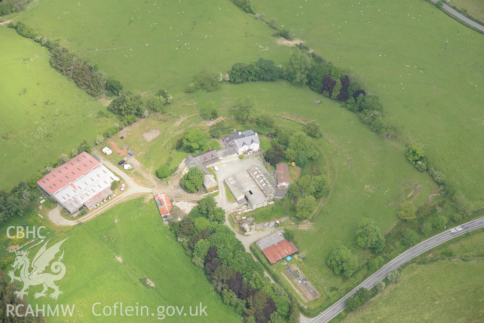 Colwyn Castle, Colwyn Castle Roman fort and Fforest Farmhouse, near Builth Wells. Oblique aerial photograph taken during the Royal Commission's programme of archaeological aerial reconnaissance by Toby Driver on 11th June 2015.