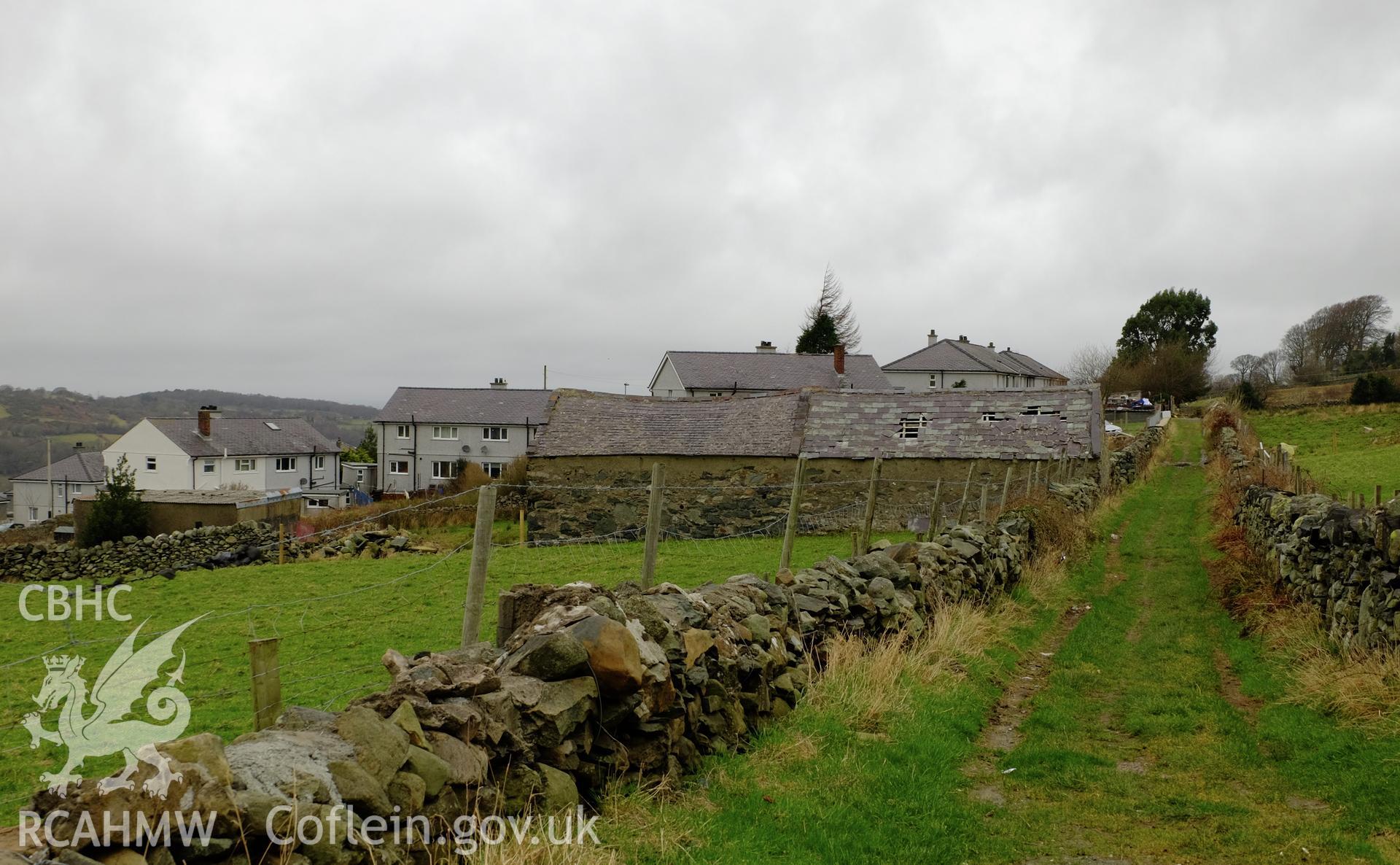 Colour photograph showing view of modern housing viewed looking north west from end of Upper Hill Street, Gerlan, Bethesda, produced by Richard Hayman 16th February 2017