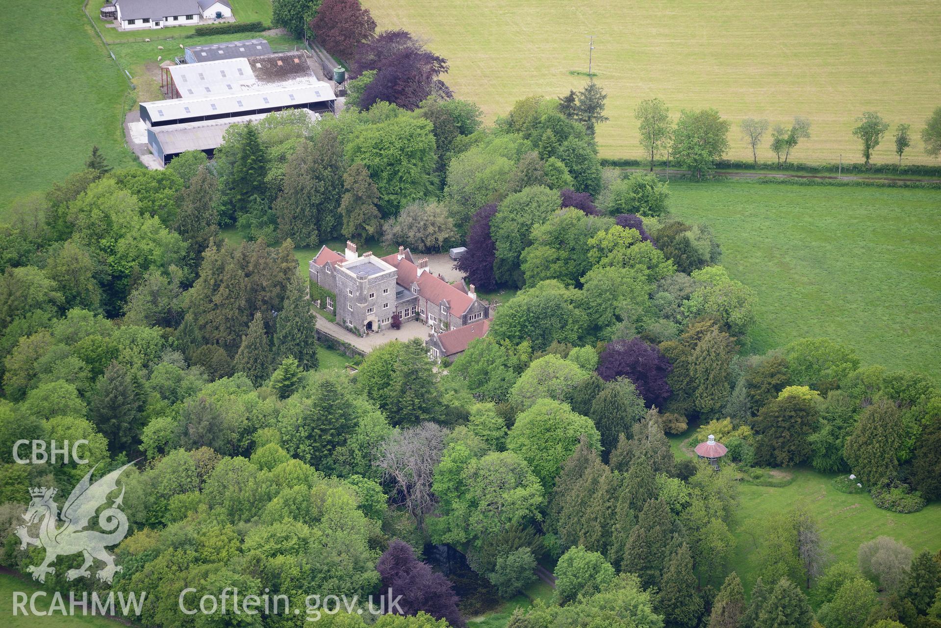 Maes-y-Crugiau Manor and Gardens, Llanllwni. Oblique aerial photograph taken during the Royal Commission's programme of archaeological aerial reconnaissance by Toby Driver on 3rd June 2015.