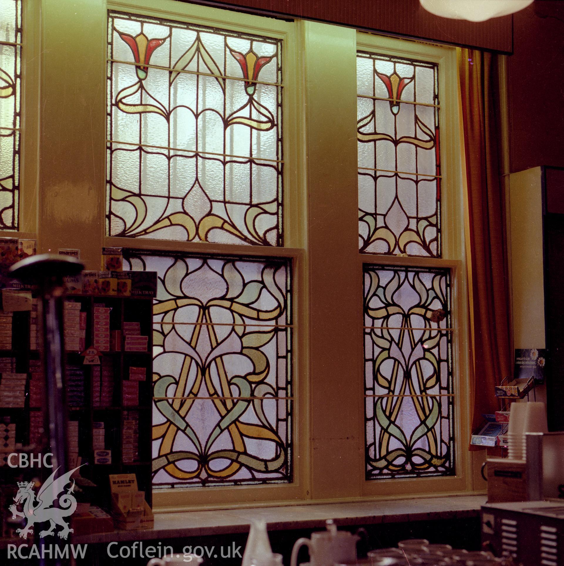 Digital copy of a colour negative showing stained glass window at Neath Railway Station, taken by RCAHMW.