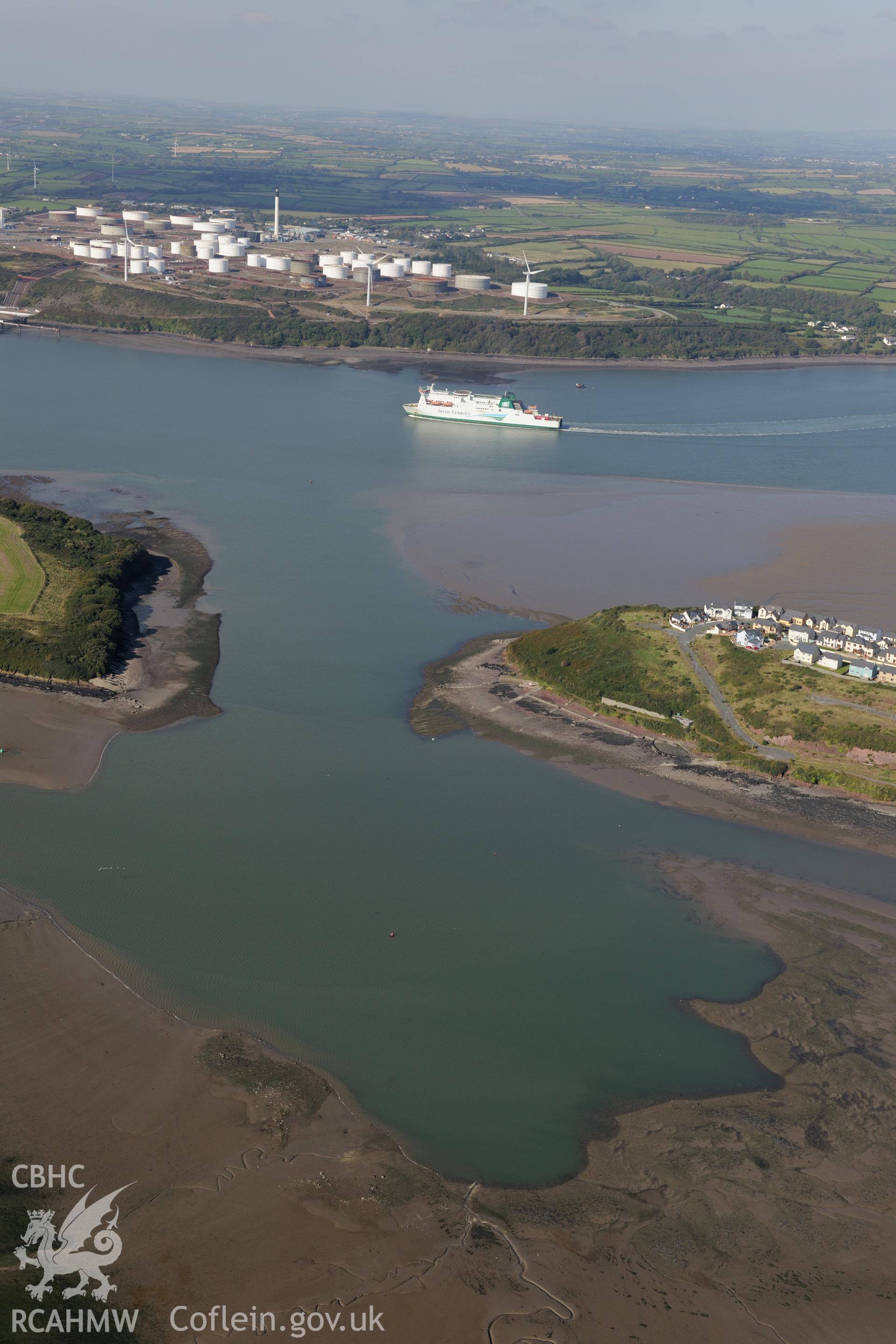 Pillbox, and the Gulf Oil Refinery beyond, at Milford Haven. Oblique aerial photograph taken during the Royal Commission's programme of archaeological aerial reconnaissance by Toby Driver on 30th September 2015.