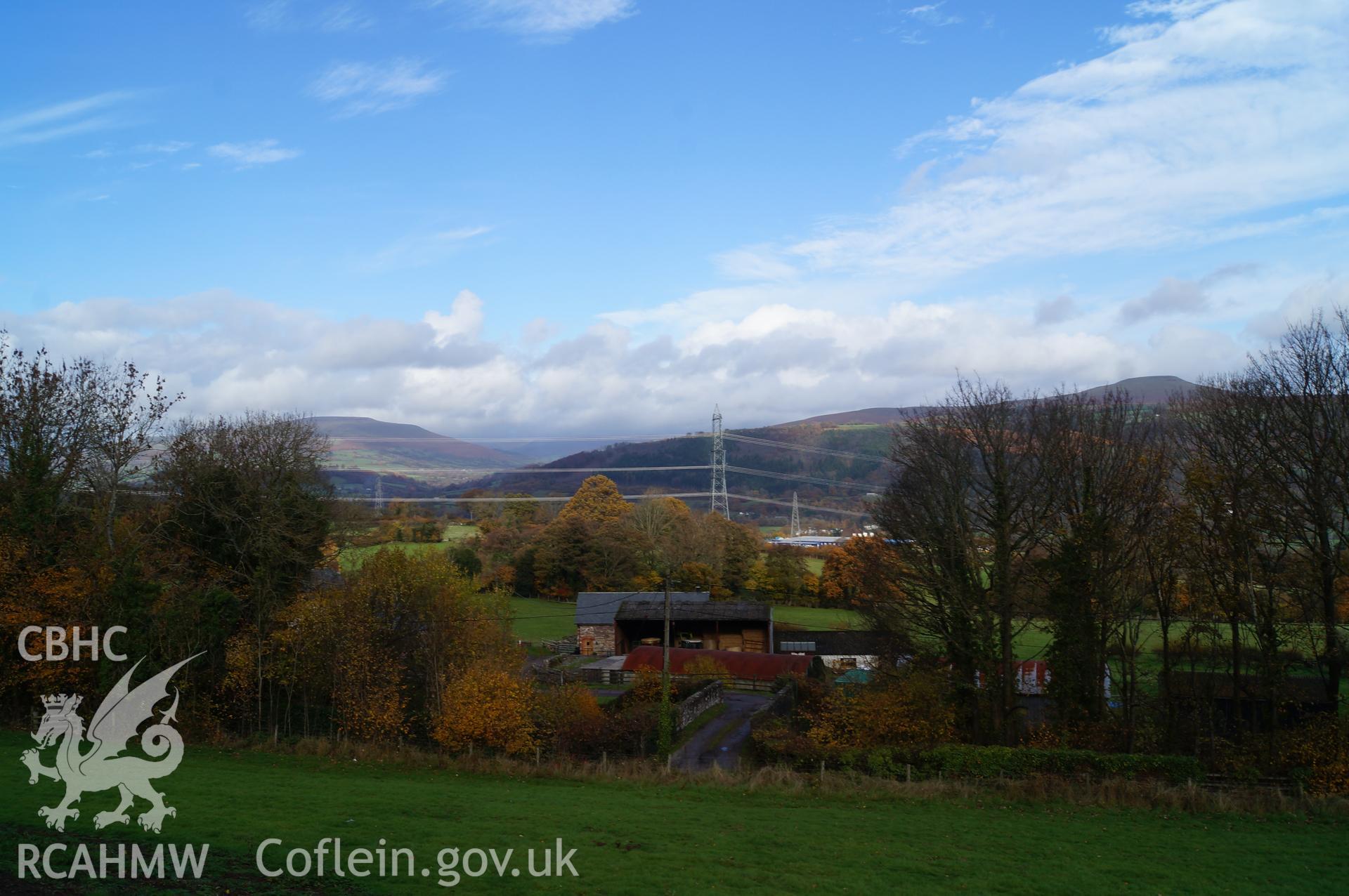 'View from garden on northern side of Little Pentre cottage, looking north towards Pentre Farm. Note the bridge across the now disused bed of the London & North West Railway.' Photographed and described by Jenny Hall and Paul Sambrook of Trysor, Nov. 2018.