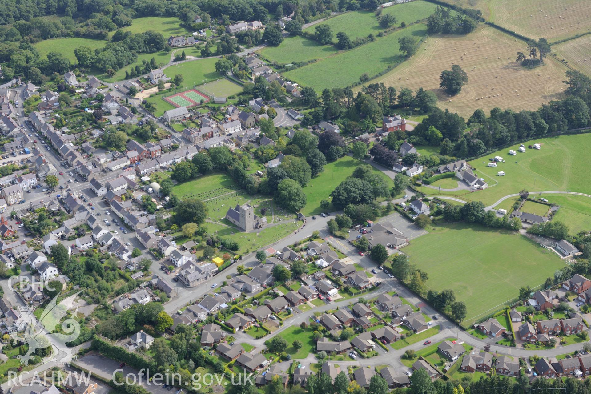 St Michael's church in the town of Caerwys, near Holywell. Oblique aerial photograph taken during the Royal Commission's programme of archaeological aerial reconnaissance by Toby Driver on 11th September 2015.
