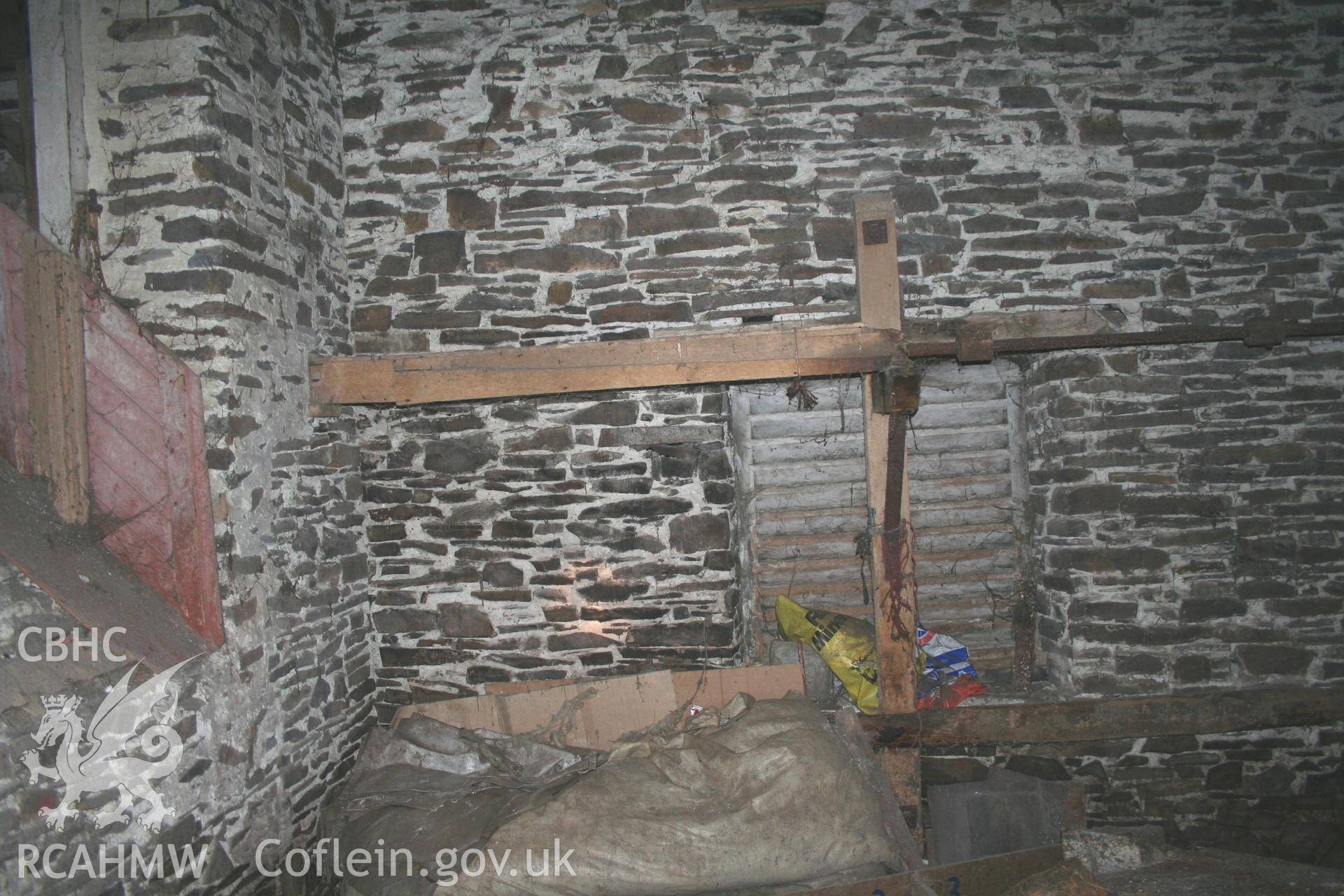 Interior view showing disused equipment. Photographic survey of the threshing house, straw house, mixing house and root house at Tan-y-Graig Farm, Llanfarian, conducted by Geoff Ward and John Wiles, 11th December 2006.