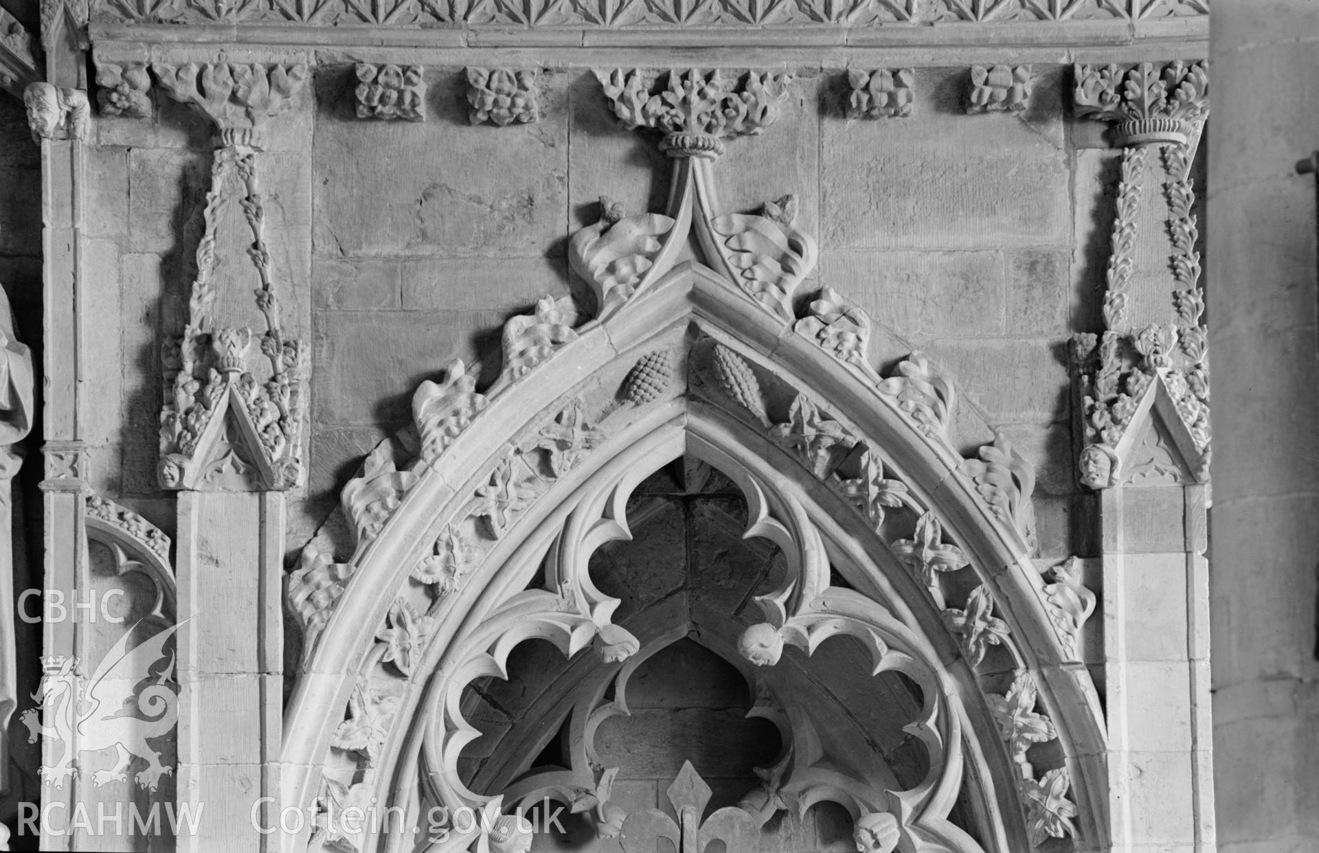 Digital copy of a black and white nitrate negative showing interior stonework decoration at St. David's Cathedral, taken by E.W. Lovegrove, July 1936.