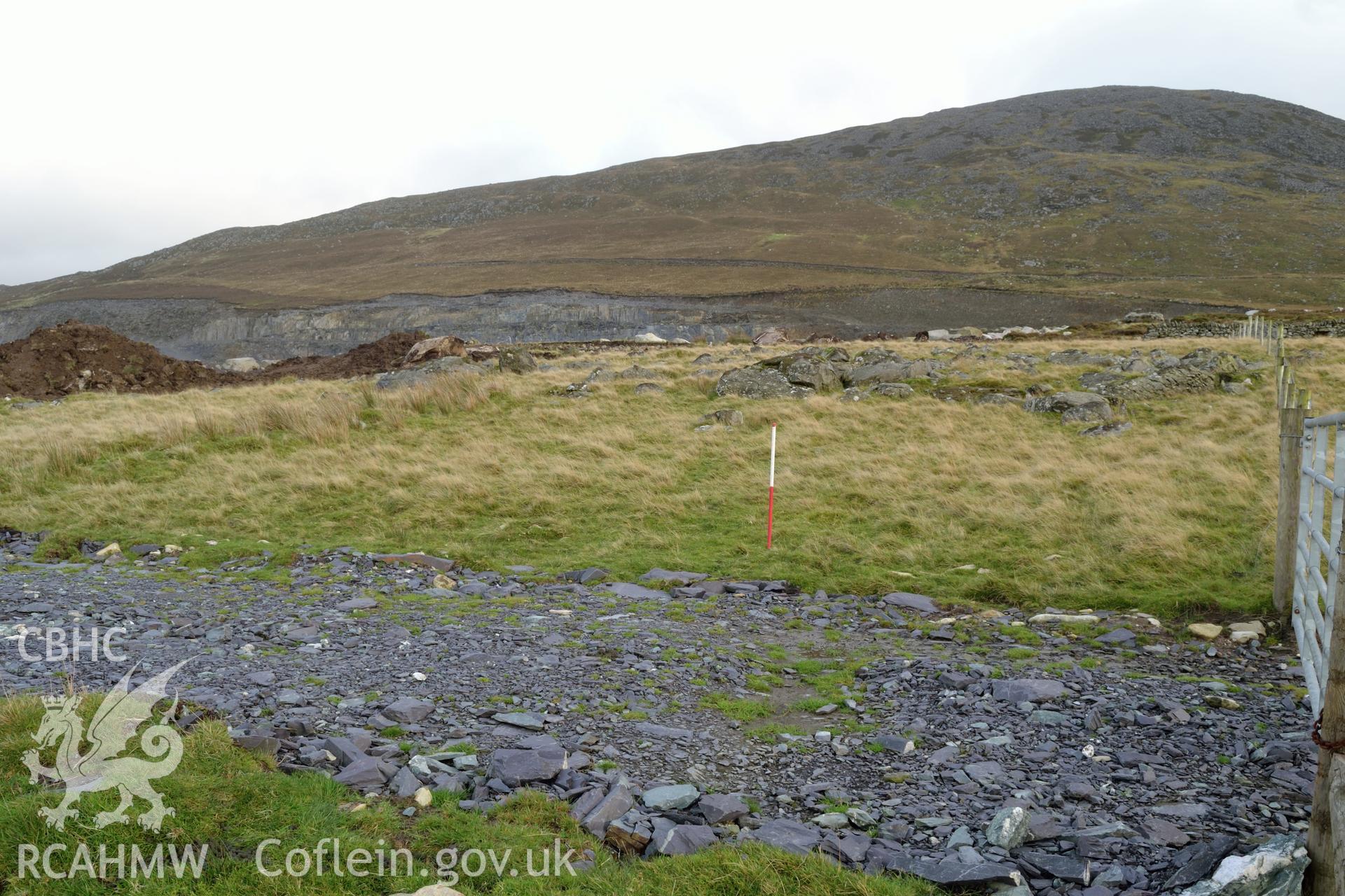 Digital photograph showing view from north west of the area not stripped with trackway in foreground at Penrhyn Quarry, Bethesda. Taken as part of photographic survey conducted by Gwynedd Archaeological Trust on 9th November 2017. Project no. 2541.