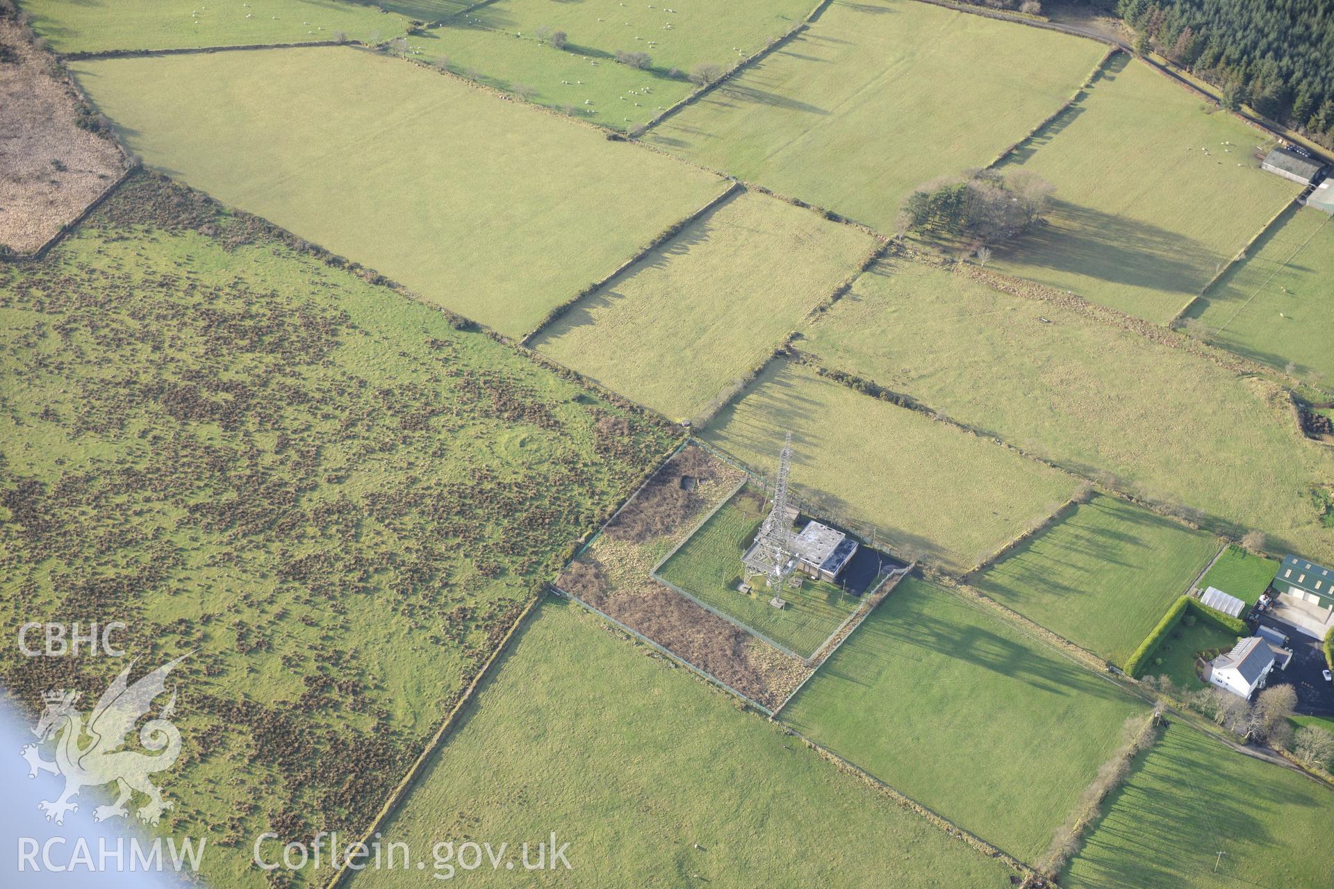 Crug-y-Rhyd-Hir, Llanllawddog. Oblique aerial photograph taken during the Royal Commission's programme of archaeological aerial reconnaissance by Toby Driver on 6th January 2015.