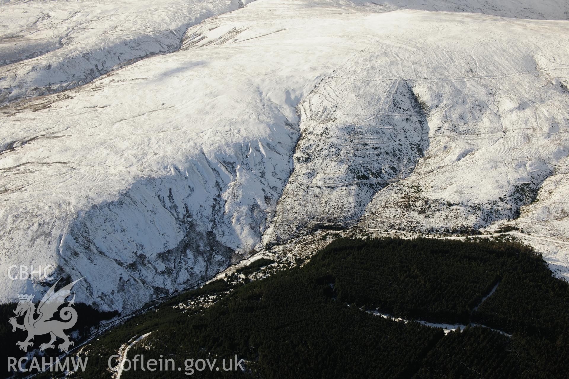 Nant-yr-Eira mine, on the western edge of Hafren Forest, near Llanidloes. Oblique aerial photograph taken during the Royal Commission's programme of archaeological aerial reconnaissance by Toby Driver on 4th February 2015.
