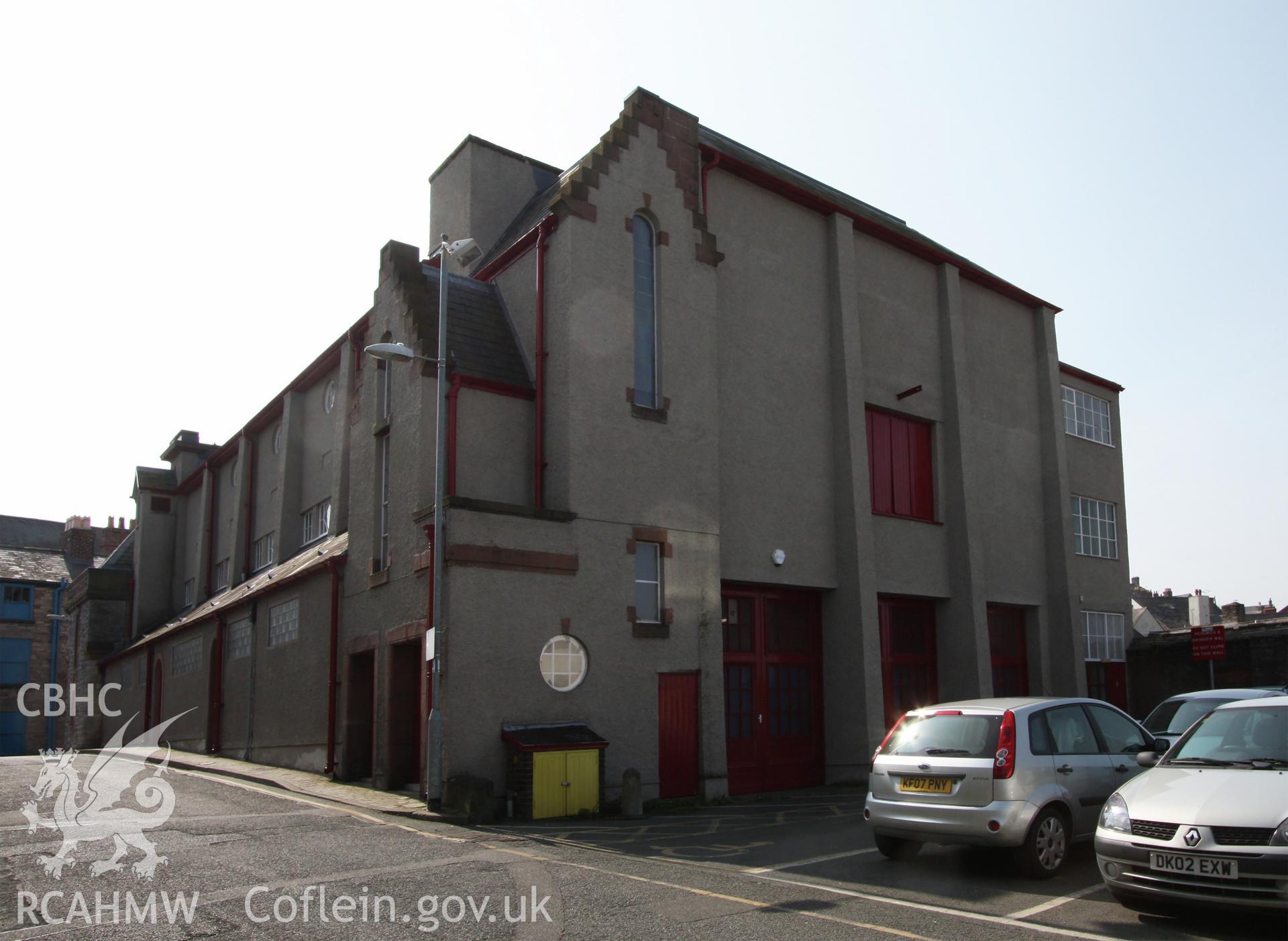 Digital colour photograph showing exterior side and rear elevation of Denbigh Town Hall. Photographed during survey conducted by Sue Fielding on 20th July 2010.