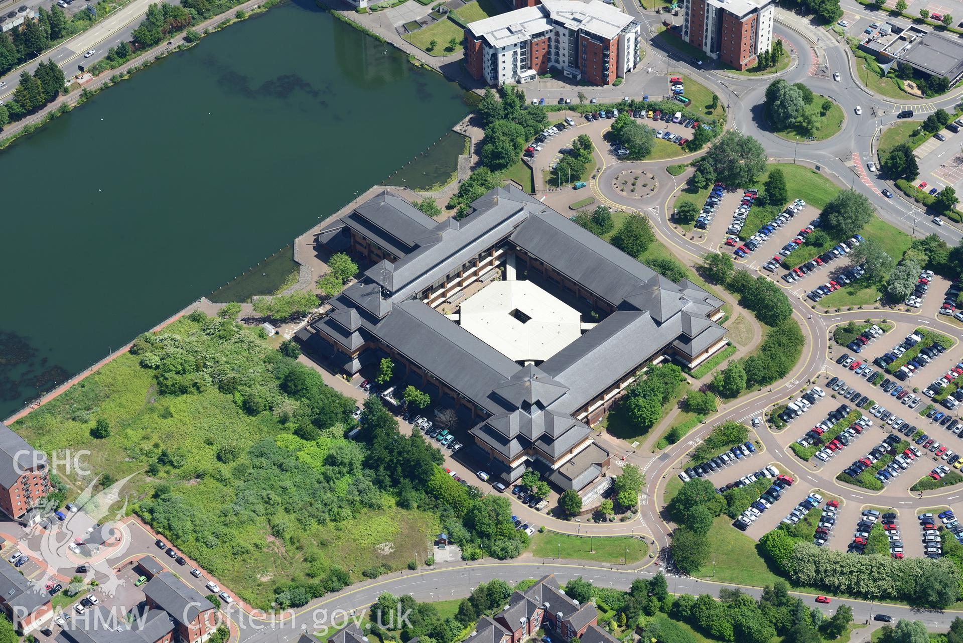 South Glamorgan County Hall, overlooking Bute East Dock, Cardiff Bay. Oblique aerial photograph taken during the Royal Commission's programme of archaeological aerial reconnaissance by Toby Driver on 29th June 2015.