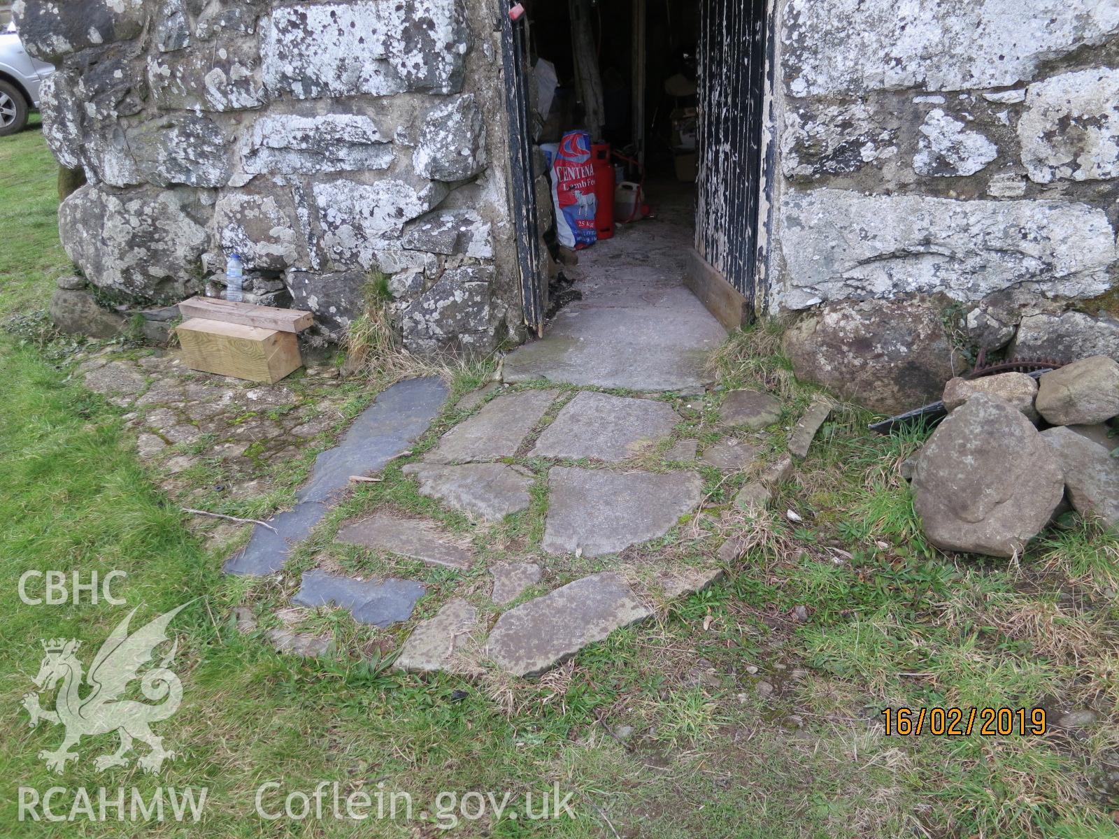 Exterior flagstones entrance of barn at Pencerrig Pellaf, Ffordd Uchaf, Harlech. Photographed by Kimberley Urch as part of photographic survey for planning application (ref. no. NP5/61/LB446A Snowdonia National Park Authority).