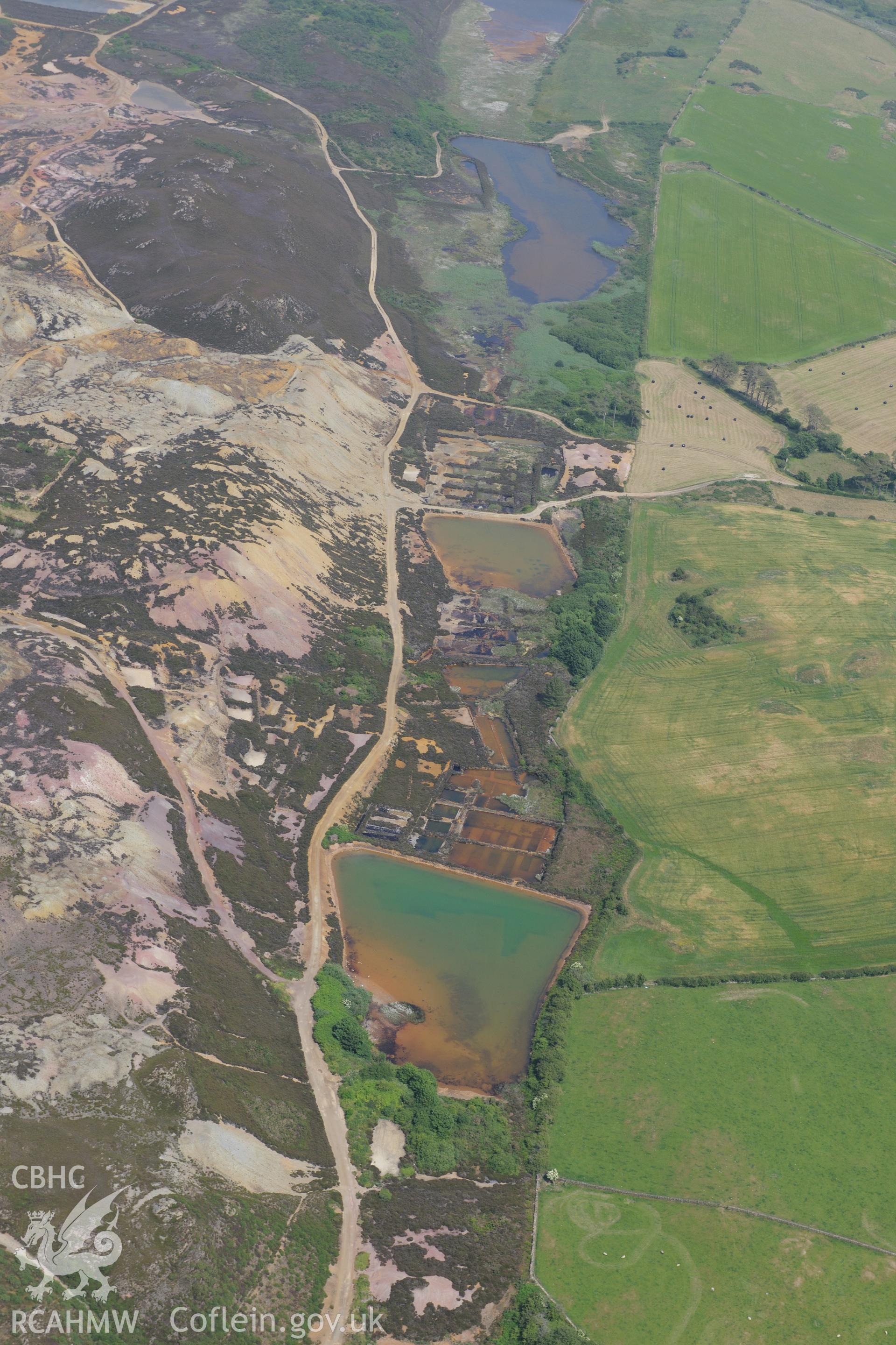 Parys Mountain copper mines, Amlwch, Anglesey. Oblique aerial photograph taken during the Royal Commission?s programme of archaeological aerial reconnaissance by Toby Driver on 12th July 2013.