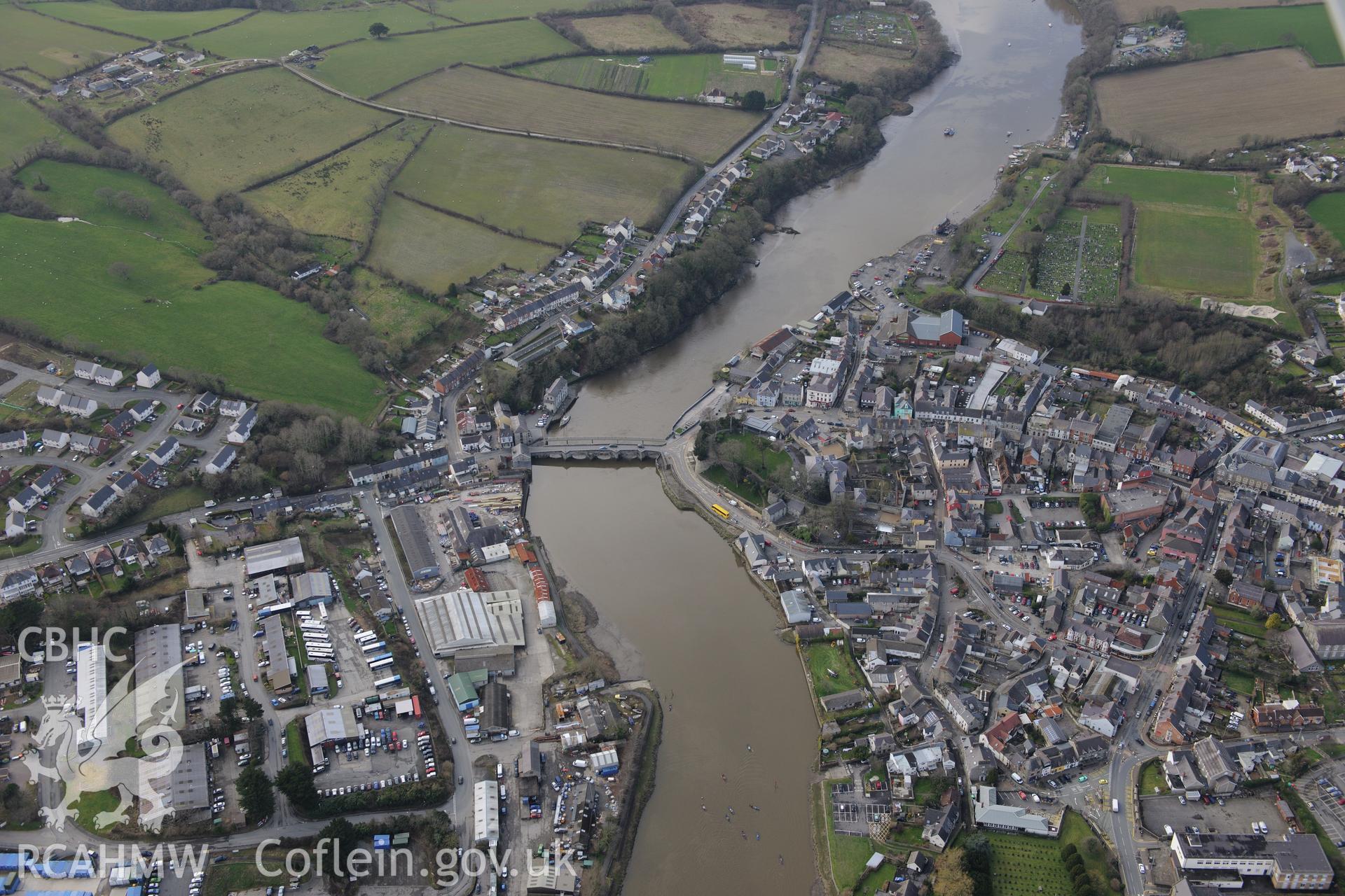 Cardigan Castle, bridge and Bridgend Foundry, Cardigan. Oblique aerial photograph taken during the Royal Commission's programme of archaeological aerial reconnaissance by Toby Driver on 13th March 2015.