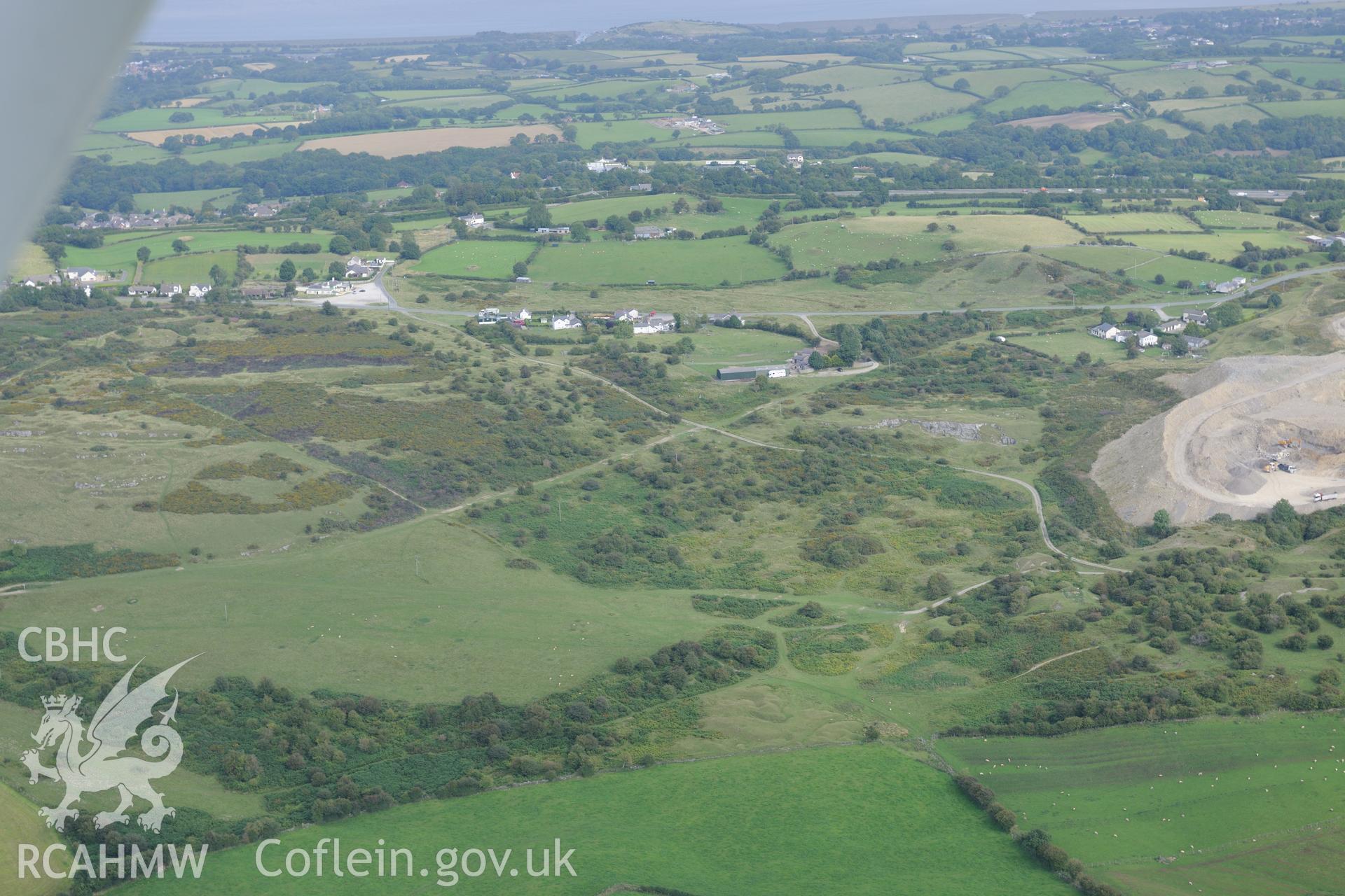 Brynmawr quarry, Pentre Halkyn, Holywell. Oblique aerial photograph taken during the Royal Commission's programme of archaeological aerial reconnaissance by Toby Driver on 11th September 2015.