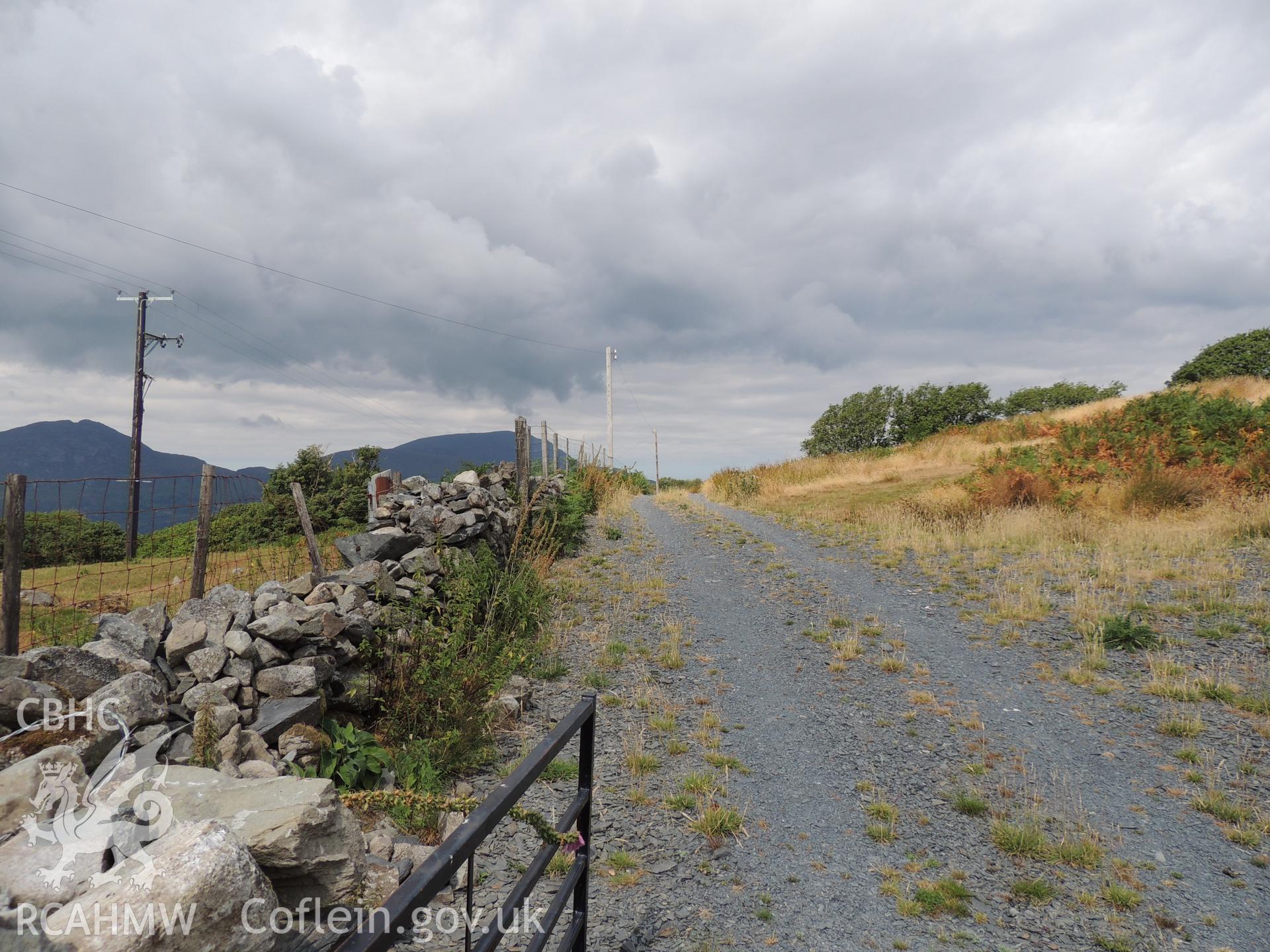 'View west towards proposed development from Parc.' Photographed as part of desk based assessment and heritage impact assessment of a hydro scheme on the Afon Croesor, Brondanw Estate, Gwynedd. Produced by Archaeology Wales for Renewables First Ltd. 2018.