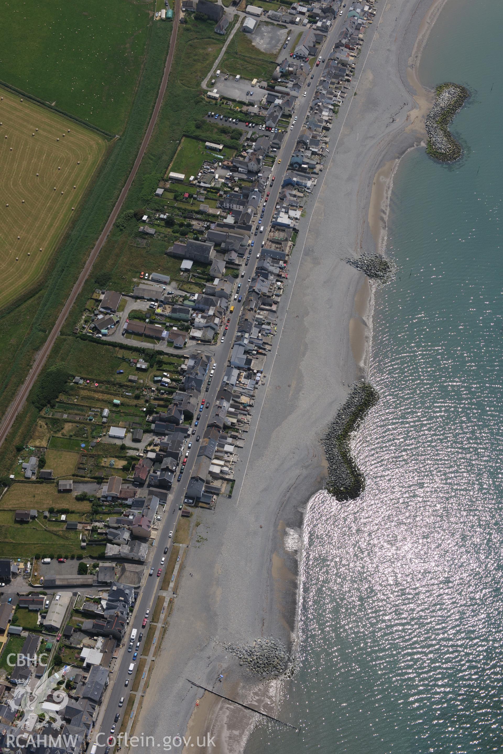 Borth village. Oblique aerial photograph taken during the Royal Commission?s programme of archaeological aerial reconnaissance by Toby Driver on 12th July 2013.