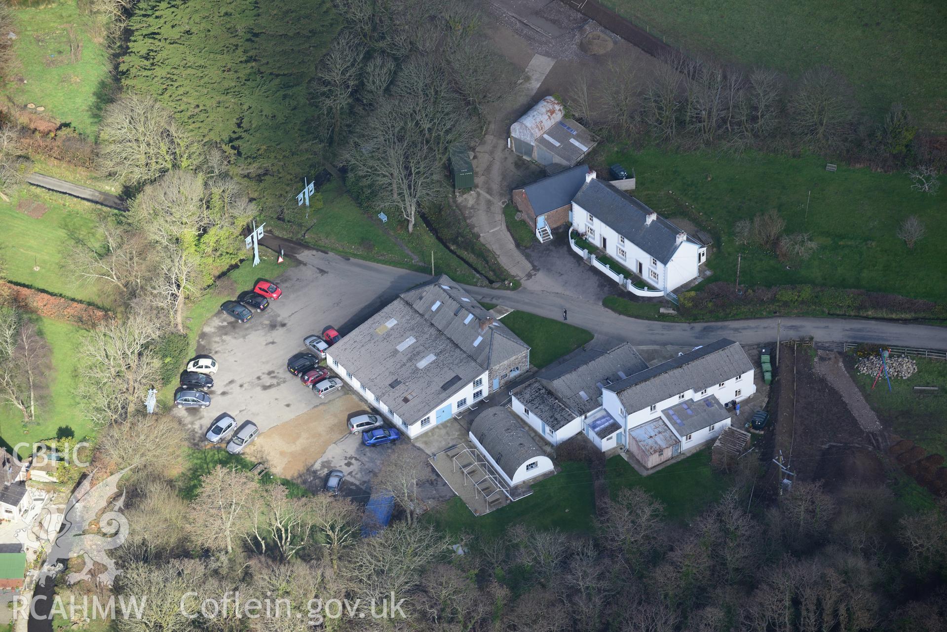 Melin Tregwynt woollen mill and Tre-Gwynt garden, Tremarchog, near Fishguard. Oblique aerial photograph taken during the Royal Commission's programme of archaeological aerial reconnaissance by Toby Driver on 13th March 2015.