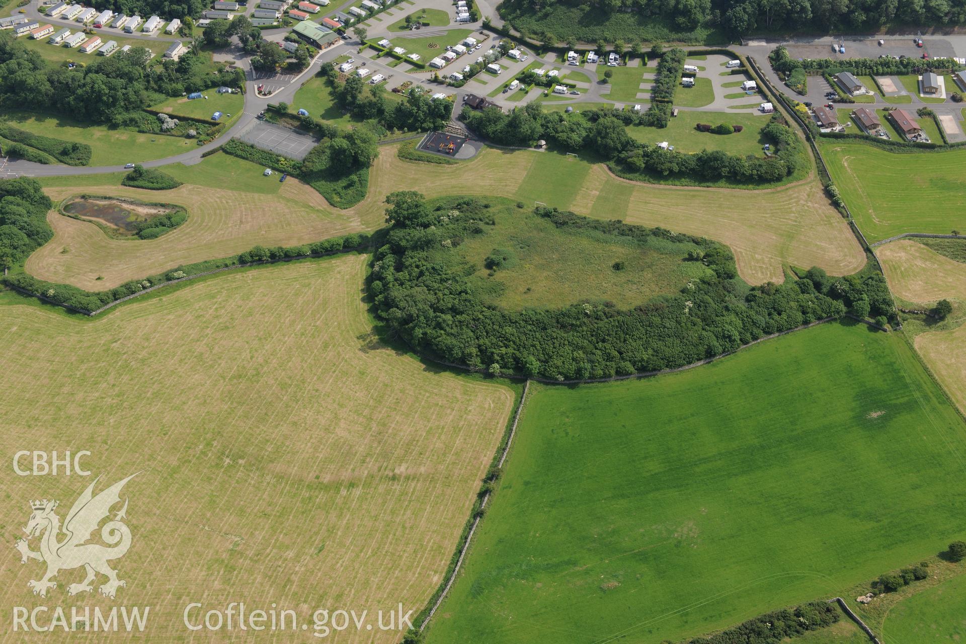Knoll to the north of Parciau Hillfort - possible site of Roman building near Moelfre, Anglesey. Oblique aerial photograph taken during the Royal Commission?s programme of archaeological aerial reconnaissance by Toby Driver on 12th July 2013.