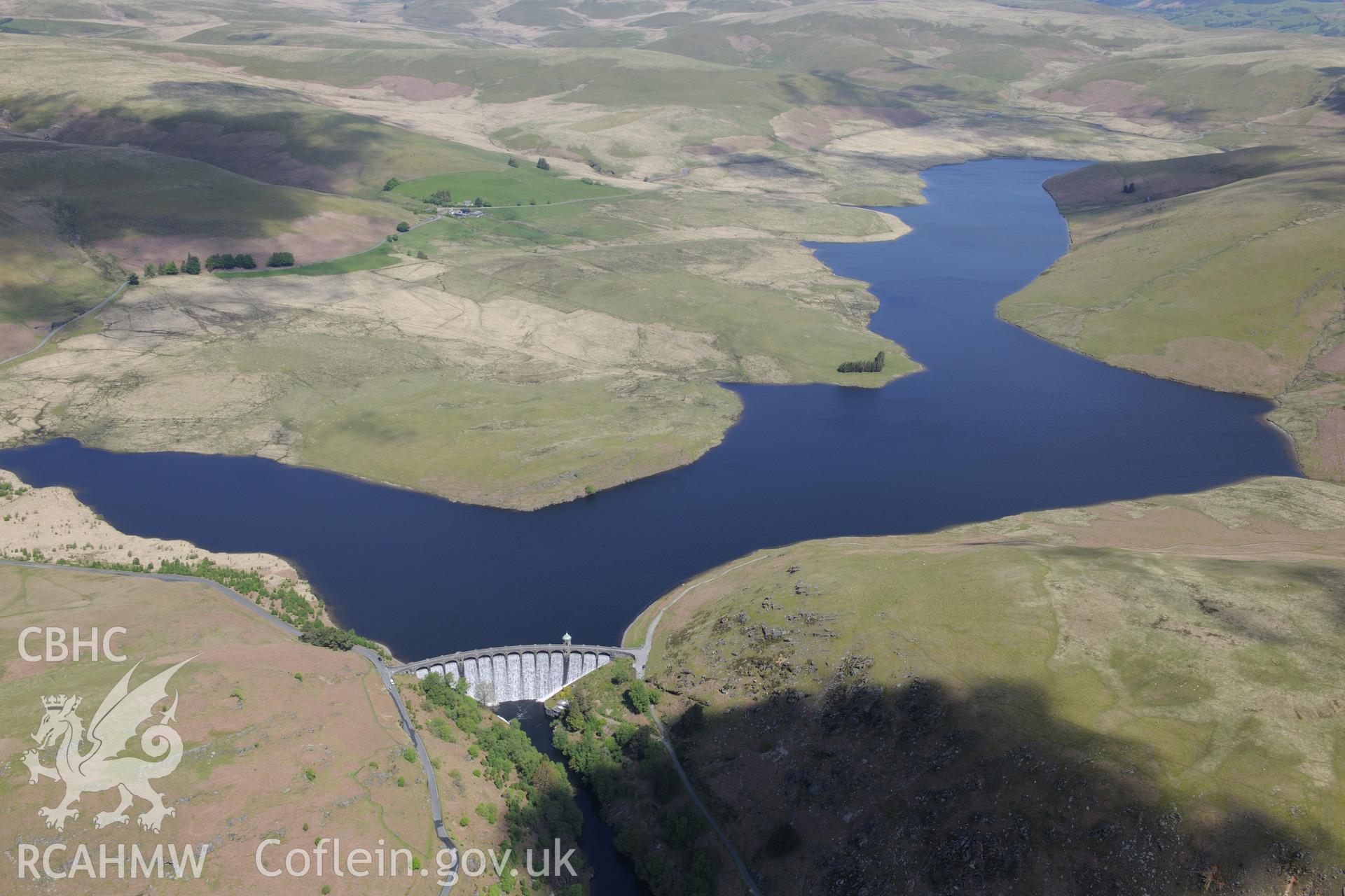 Pen-y-Garreg reservoir, and Craig Goch dam and valve tower. Oblique aerial photograph taken during the Royal Commission's programme of archaeological aerial reconnaissance by Toby Driver on 3rd June 2015.