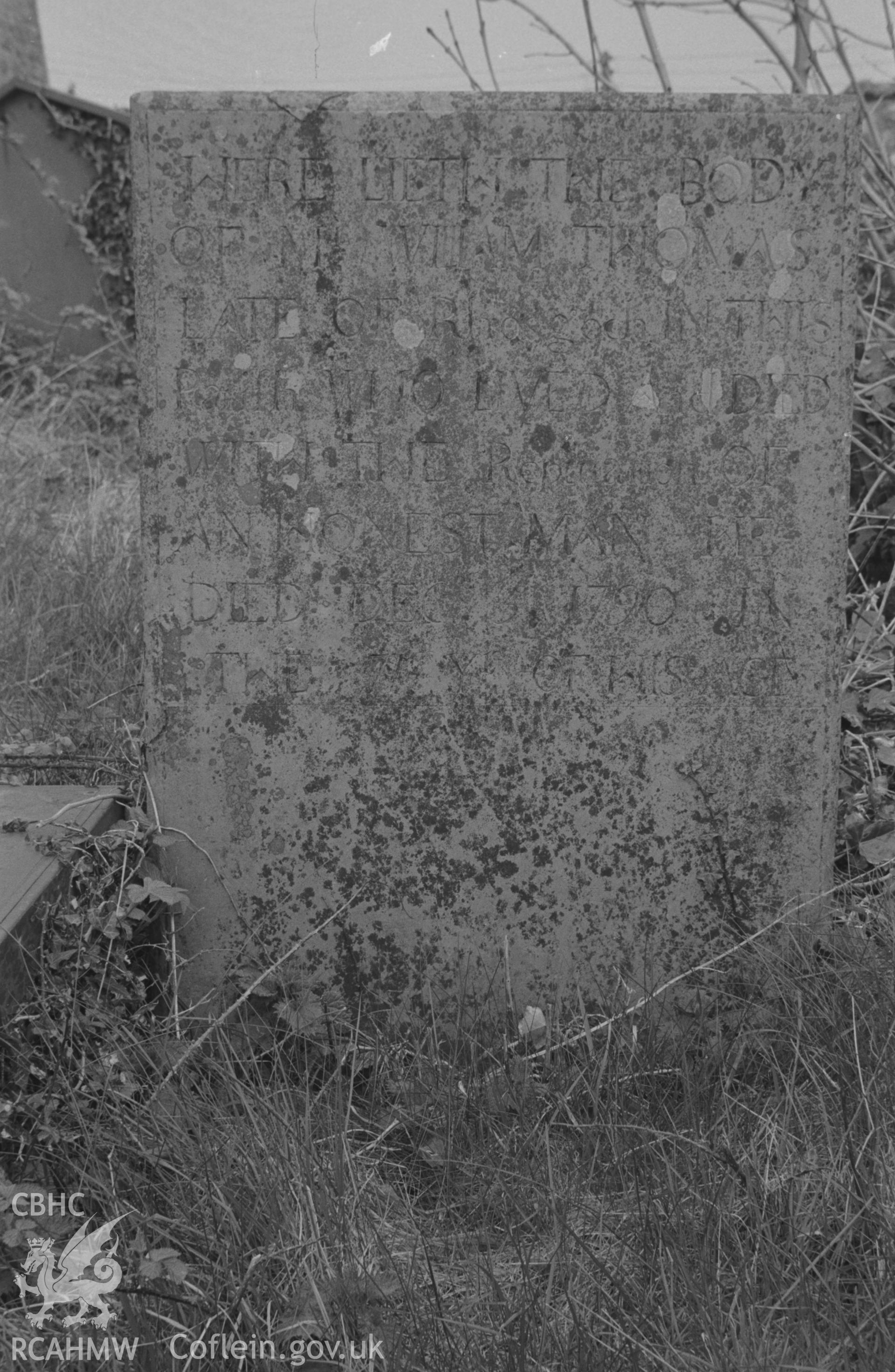 Digital copy of a black and white negative showing 1790s gravestone to the memory of William Thomas of Rhosgoda in churchyard to south of St. David's church, Llanarth. Photographed by Arthur O. Chater on 13th April 1967 from Grid Reference SN 423 578.