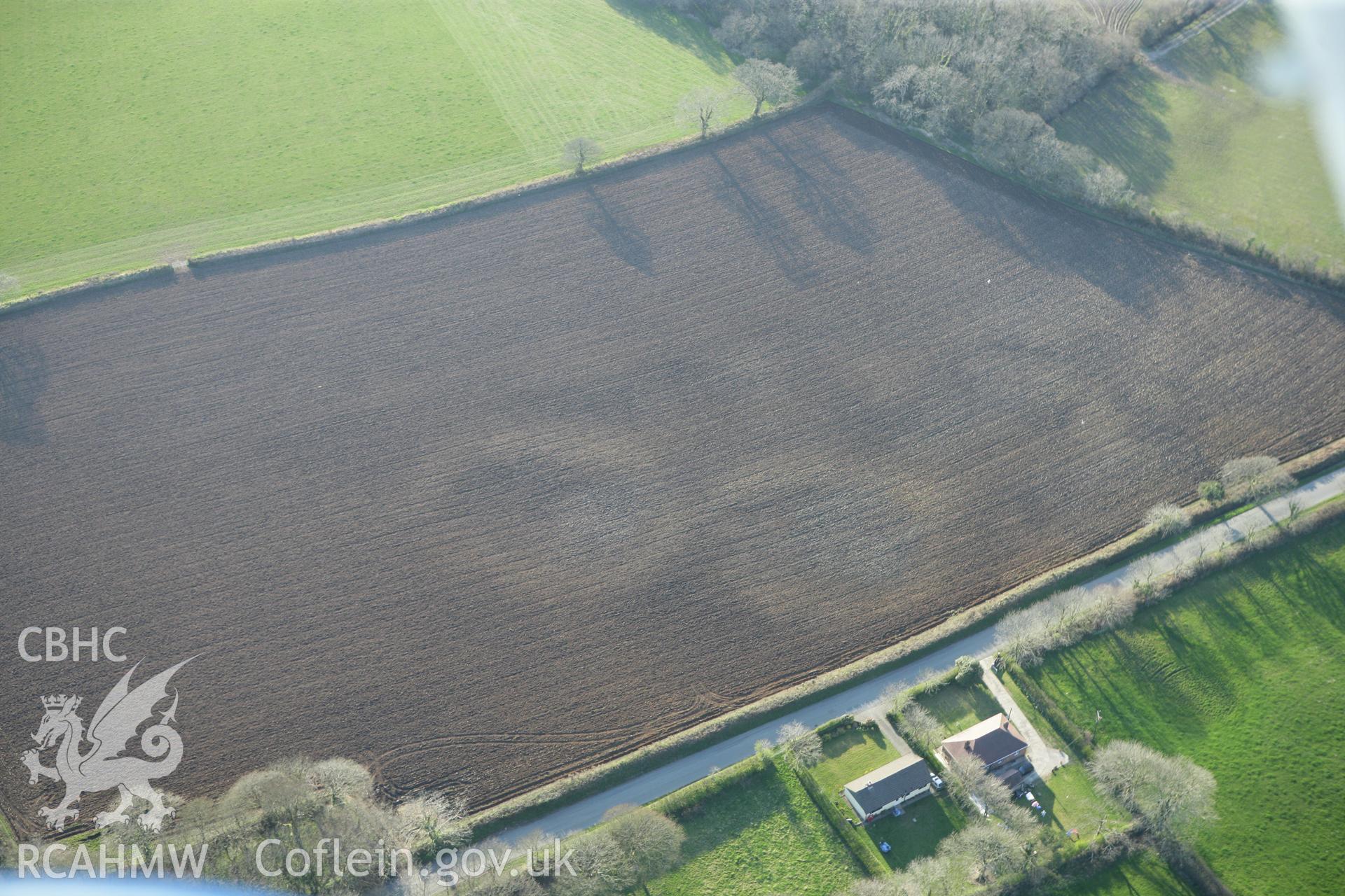 RCAHMW colour oblique aerial photograph of earthworks of Long Wood Quarries. Taken on 13 April 2010 by Toby Driver