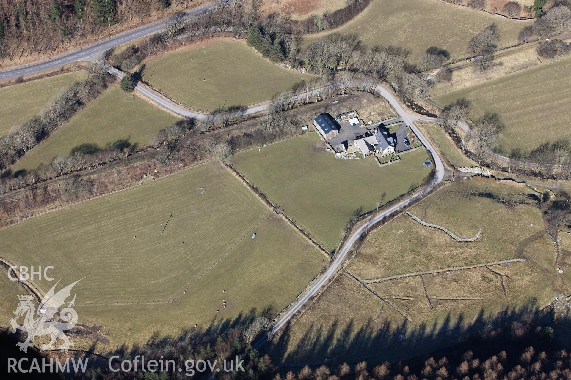 RCAHMW colour oblique photograph of Dolddeuli standing stone. Taken by Toby Driver on 08/03/2010.