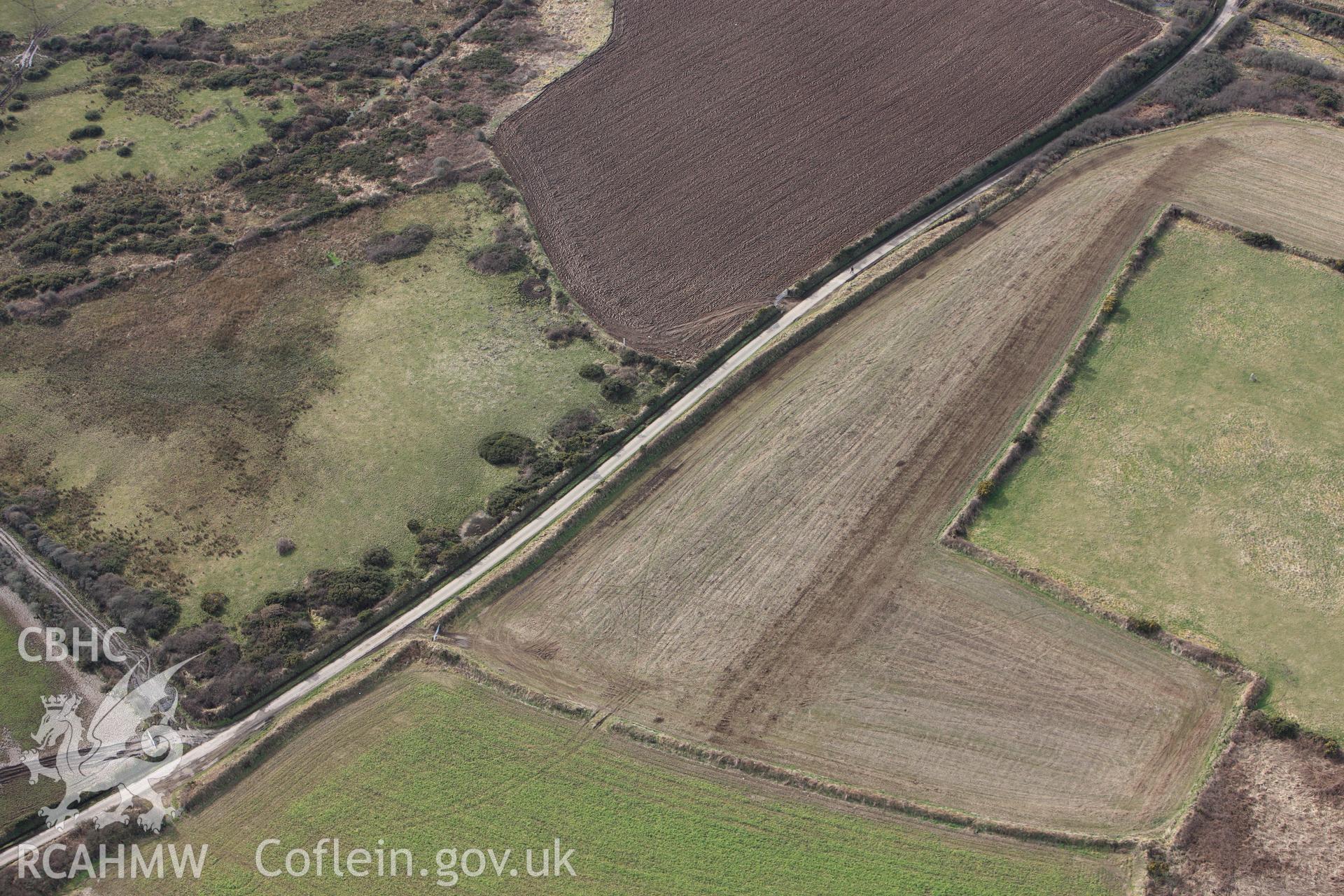 RCAHMW colour oblique aerial photograph of Ffos y Mynach, St Davids. Taken on 02 March 2010 by Toby Driver