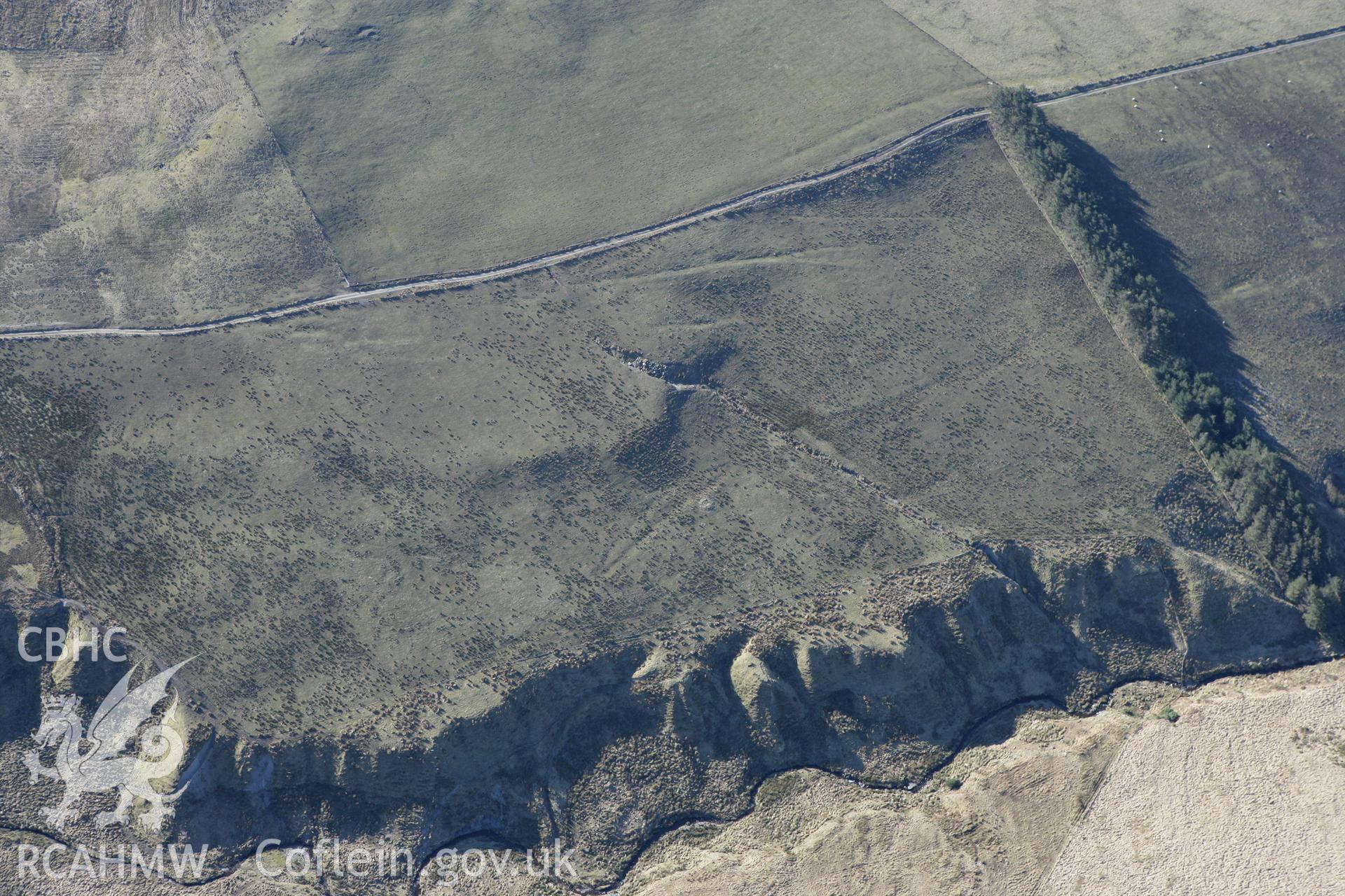 RCAHMW colour oblique photograph of Cae'r Arglwyddes east cairn. Taken by Toby Driver on 08/03/2010.