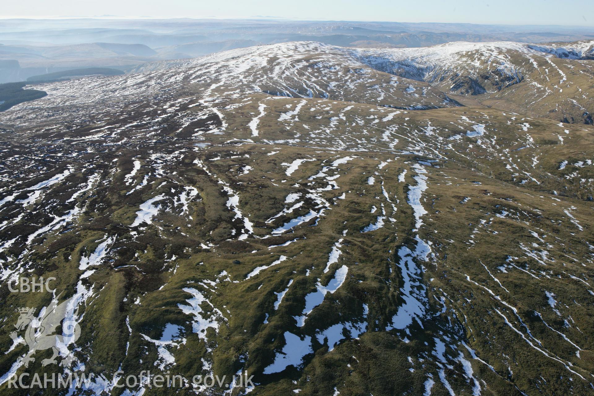 RCAHMW colour oblique photograph of Carn Fawr round cairns. Taken by Toby Driver on 08/03/2010.