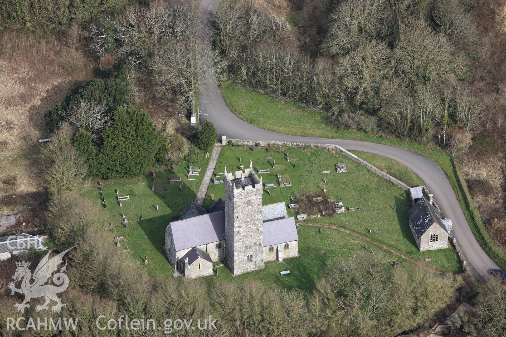 RCAHMW colour oblique aerial photograph of St Decumanus' Church, Rhoscrowther. Taken on 02 March 2010 by Toby Driver
