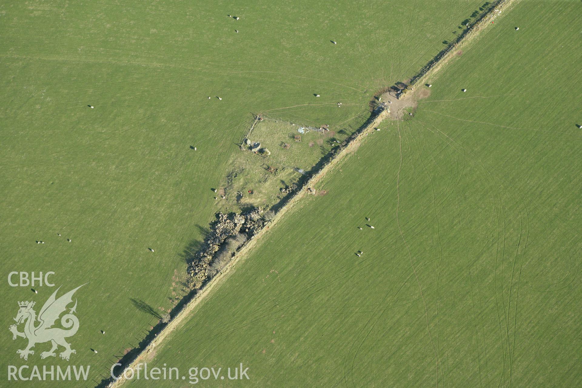 RCAHMW colour oblique aerial photograph of Glandy Cross, including a pile of boulders cleared from the fields. Taken on 13 April 2010 by Toby Driver