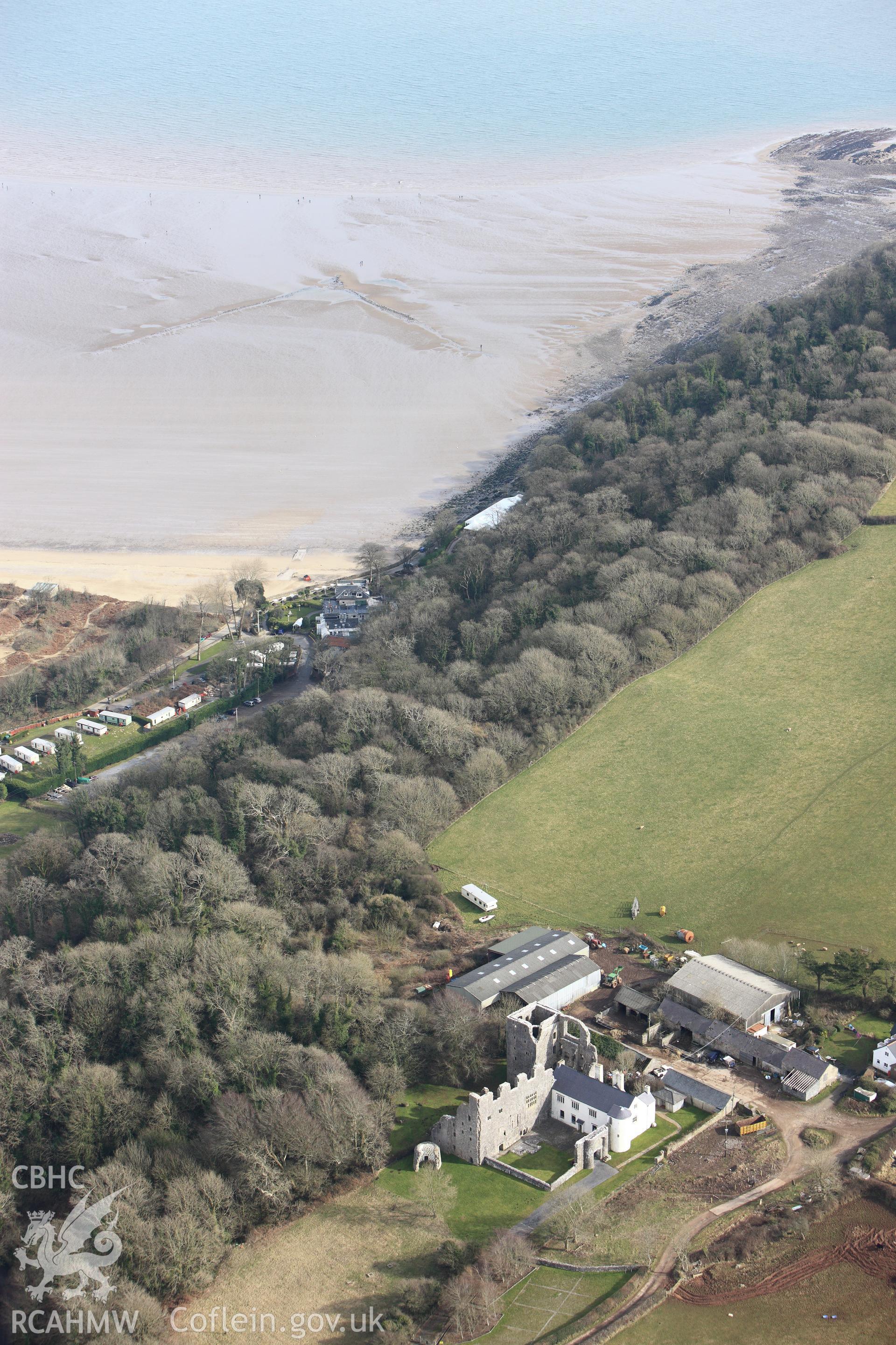 RCAHMW colour oblique photograph of Oxwich Castle, and Oxwich Bay, fish trap. Taken by Toby Driver on 02/03/2010.