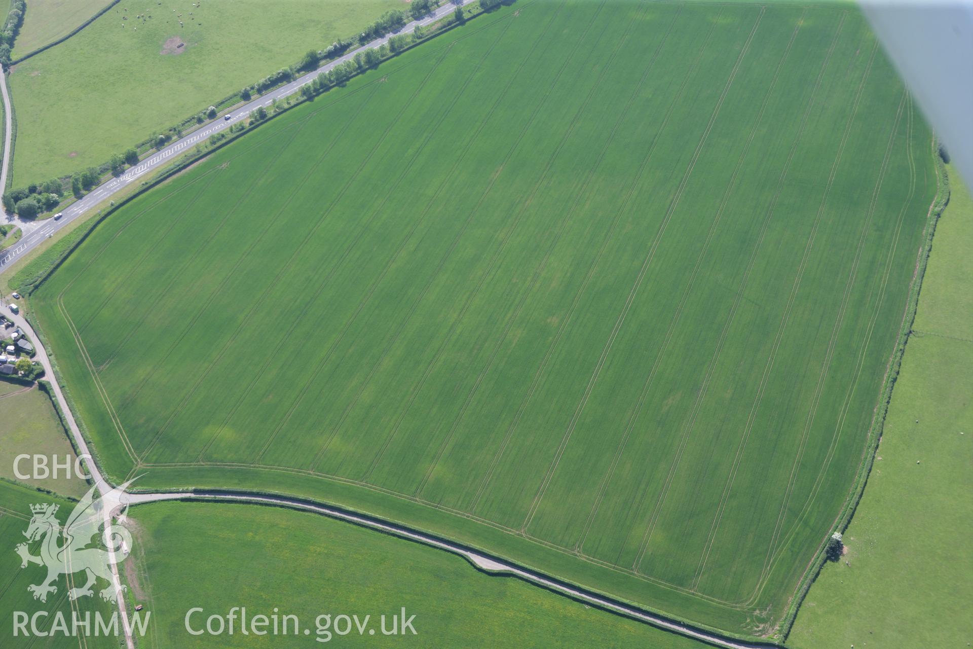 RCAHMW colour oblique photograph of Five Lanes Roman Site. Taken by Toby Driver on 24/05/2010.