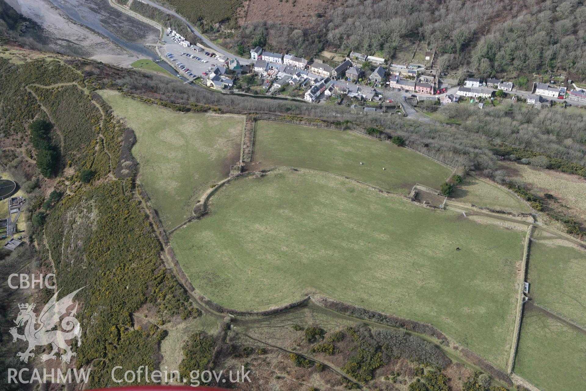 RCAHMW colour oblique aerial photograph of Solva Enclosure. Taken on 02 March 2010 by Toby Driver