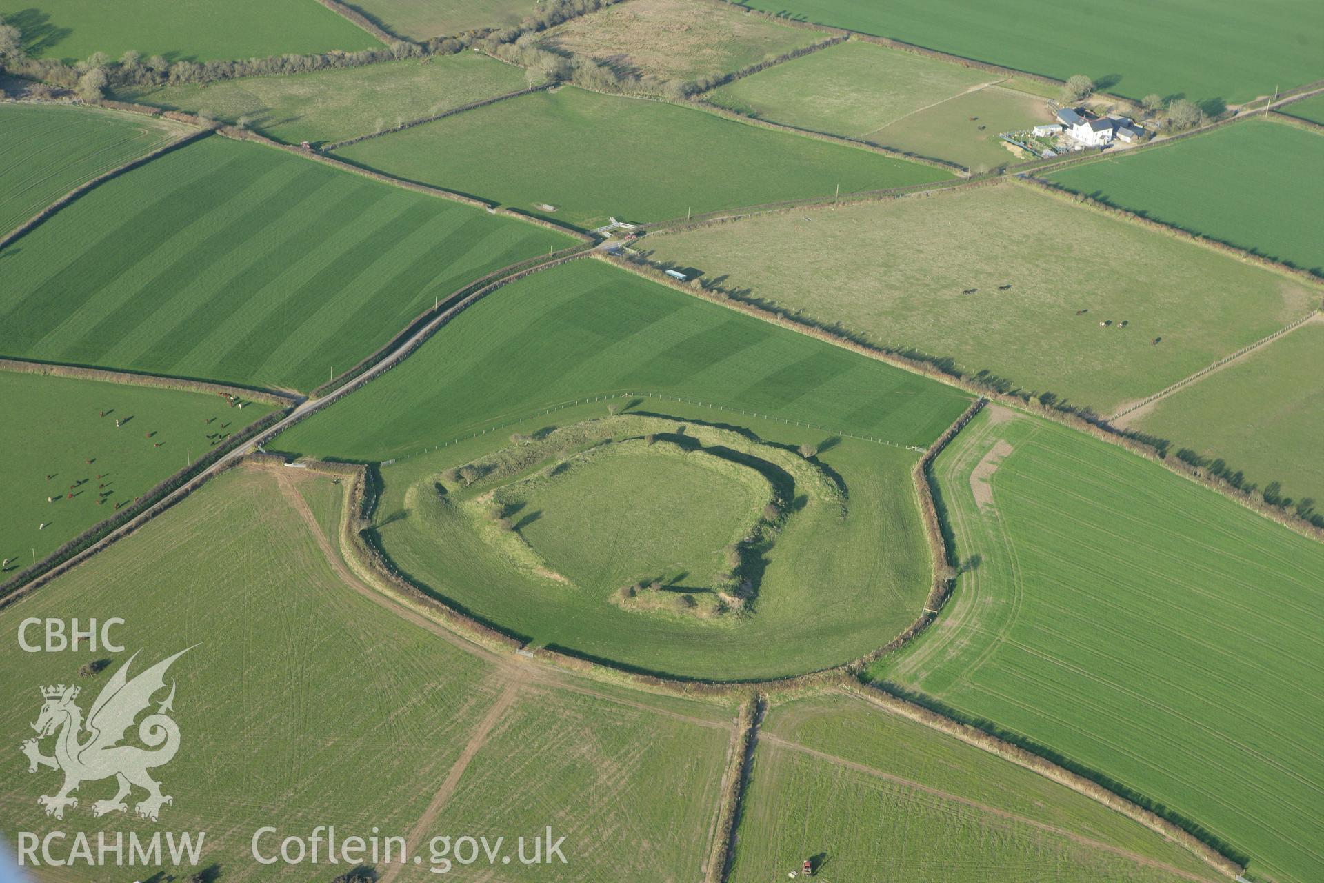 RCAHMW colour oblique aerial photograph of Romans Castle. Taken on 13 April 2010 by Toby Driver